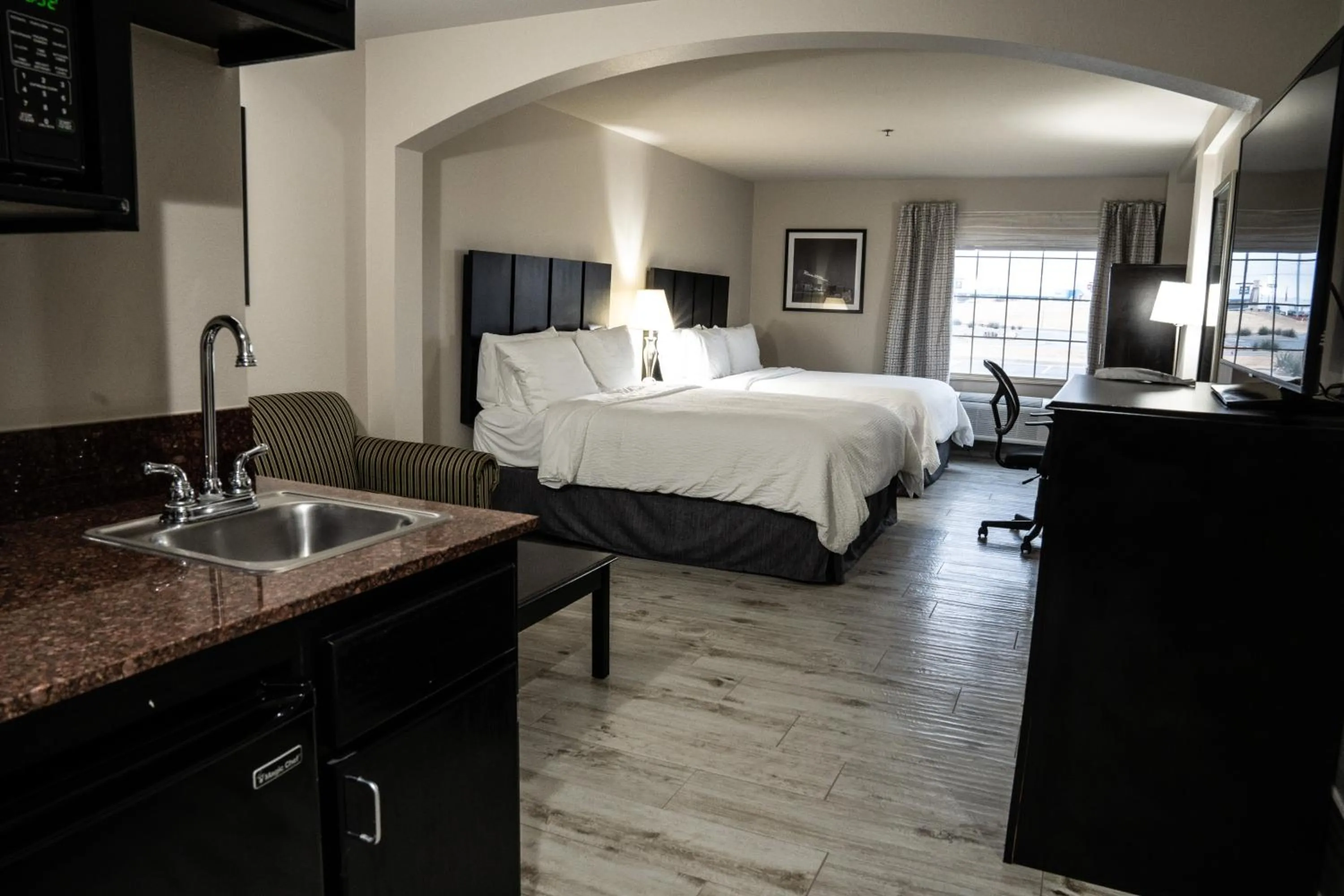 Photo of the whole room, Bed in Lucille's Hotel, Restaurant, & Bar