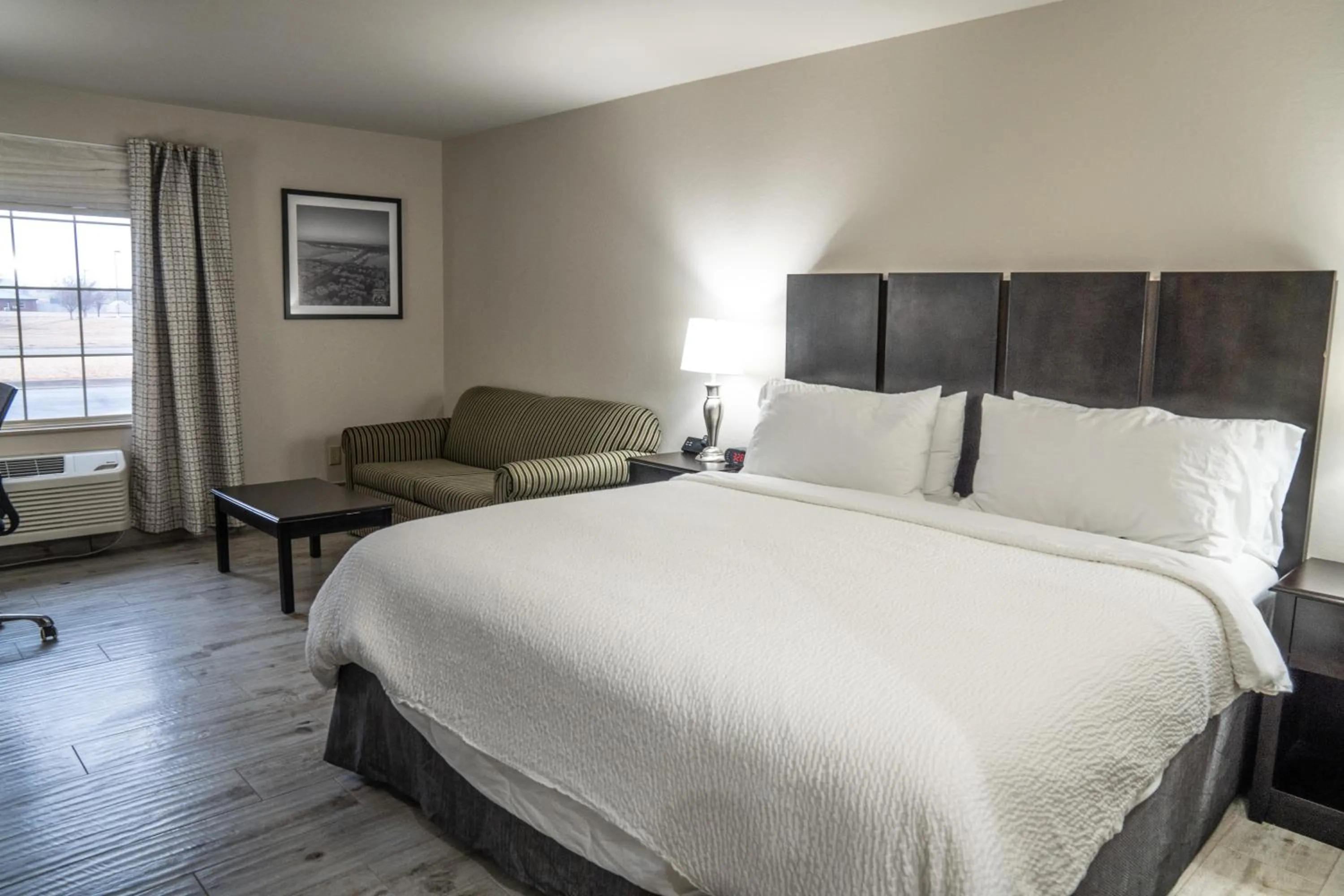 Bed in Lucille's Hotel, Restaurant, & Bar