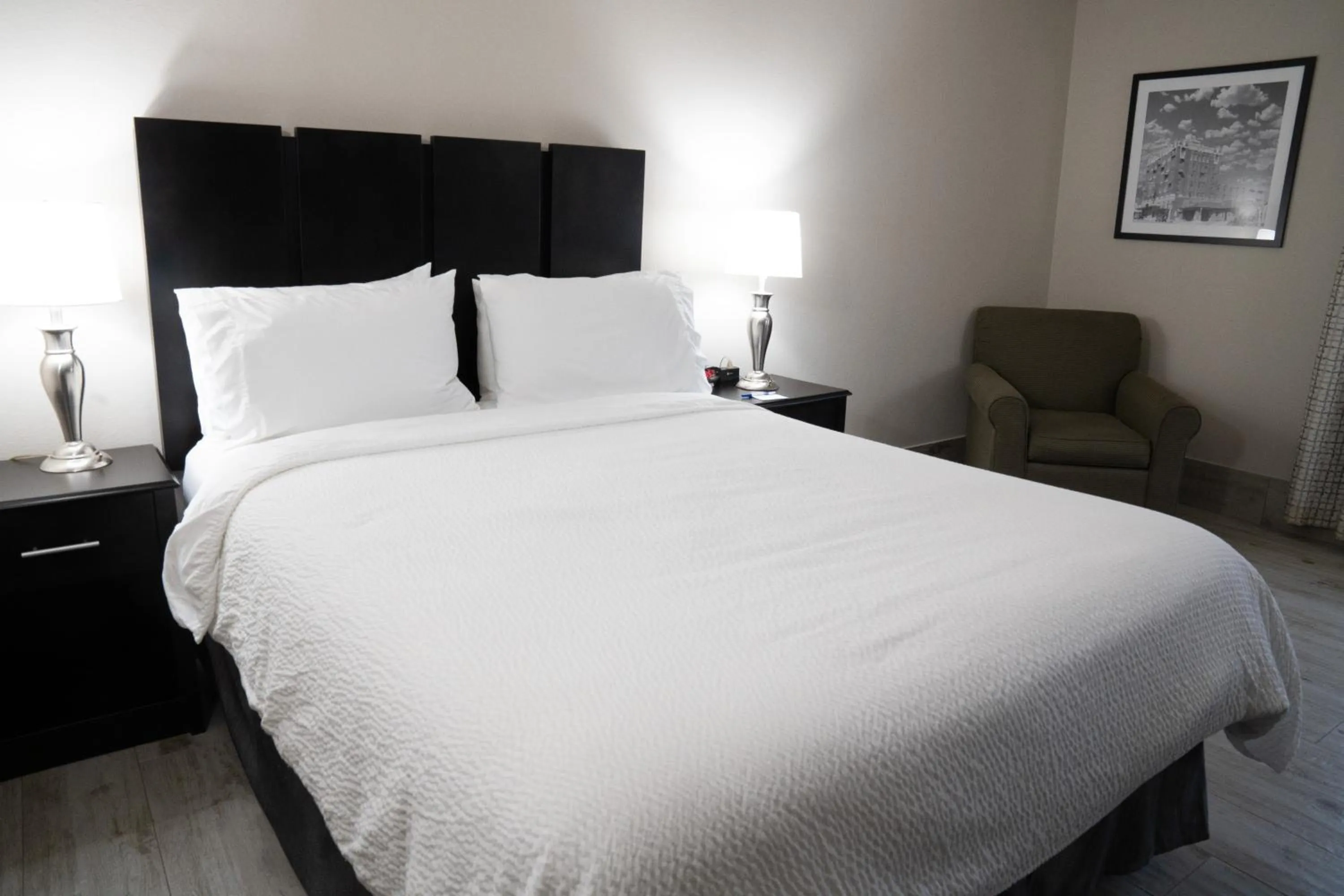 Bed in Lucille's Hotel, Restaurant, & Bar