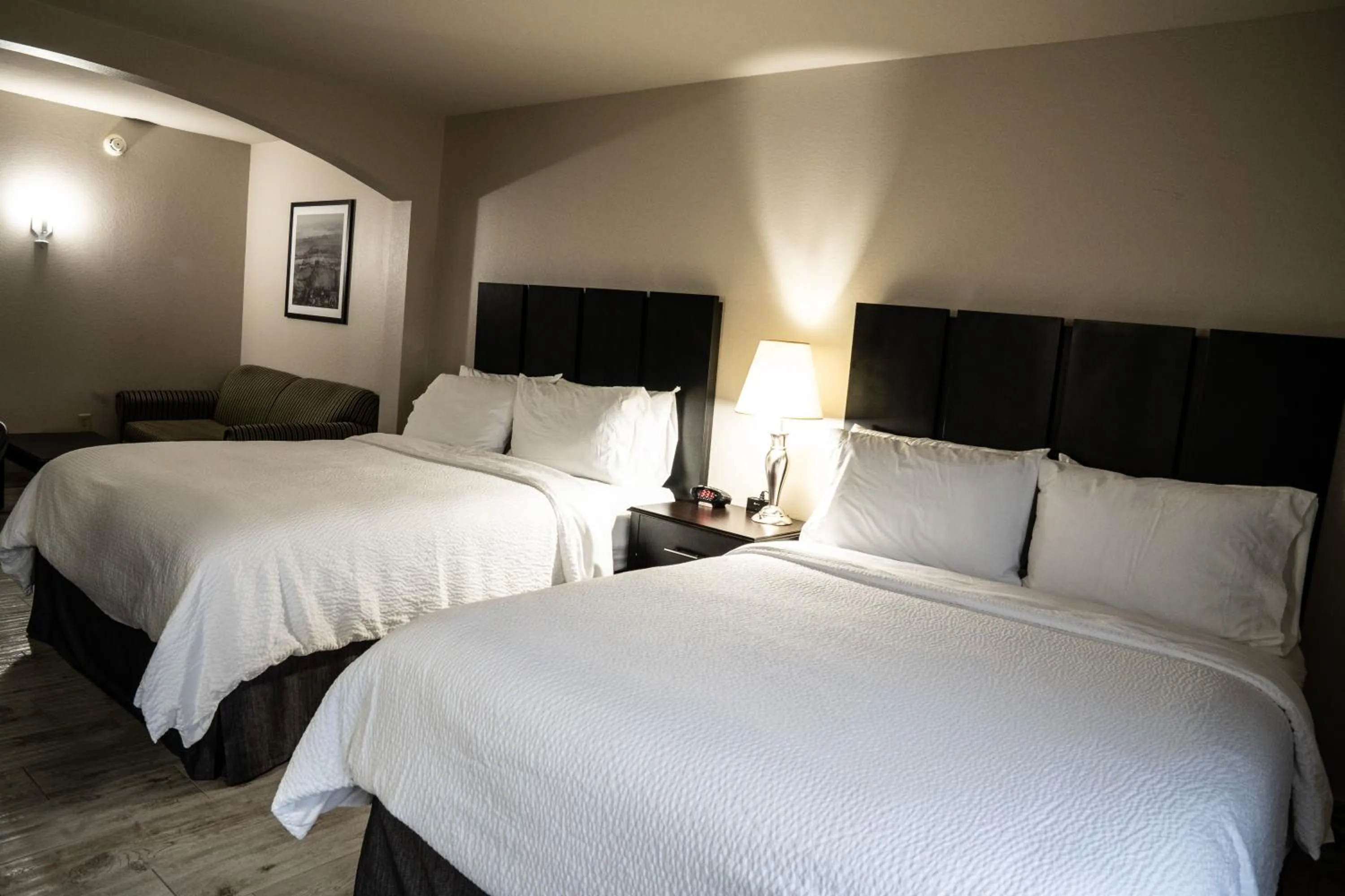 Bed in Lucille's Hotel, Restaurant, & Bar