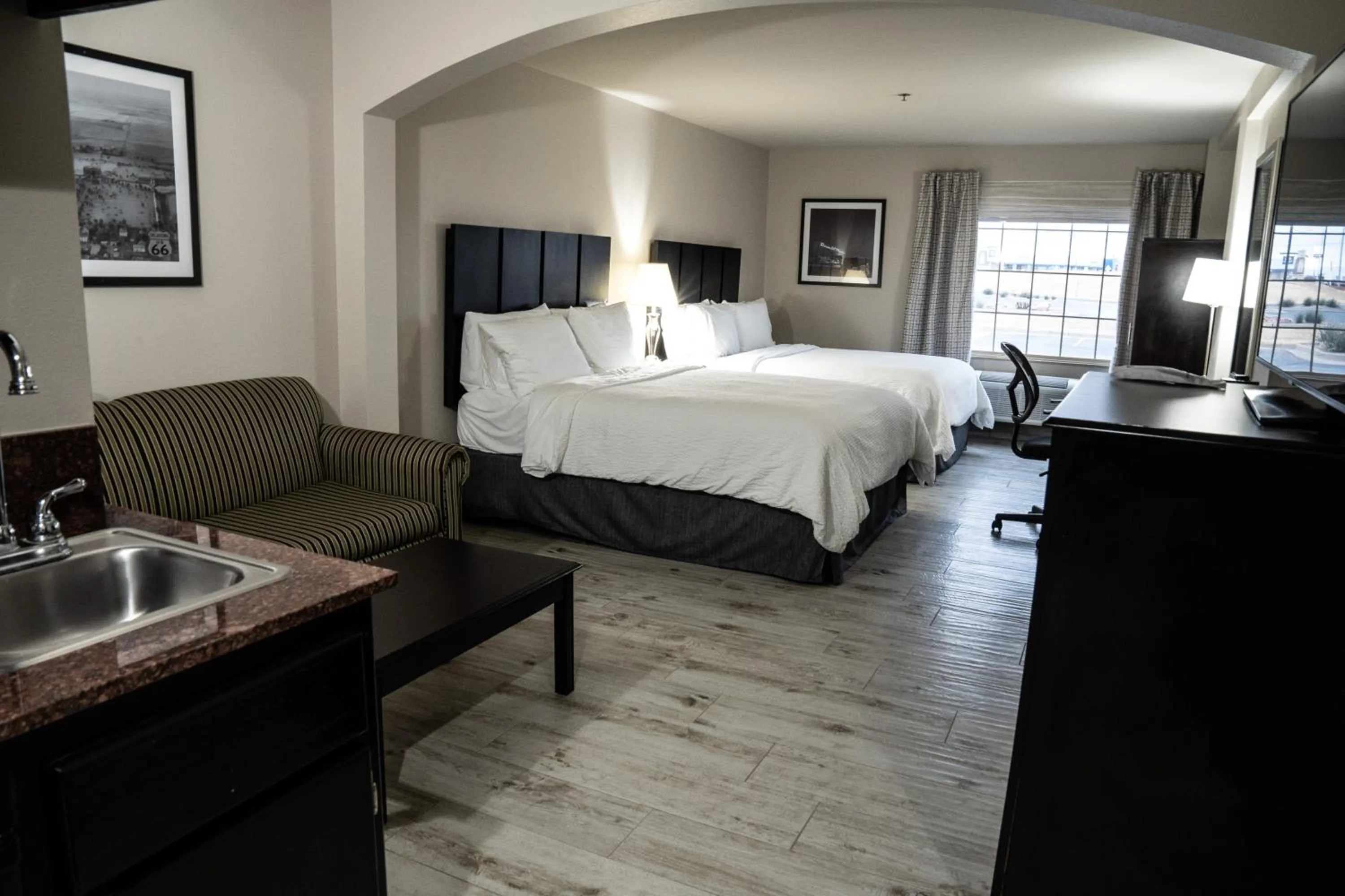 Bed in Lucille's Hotel, Restaurant, & Bar