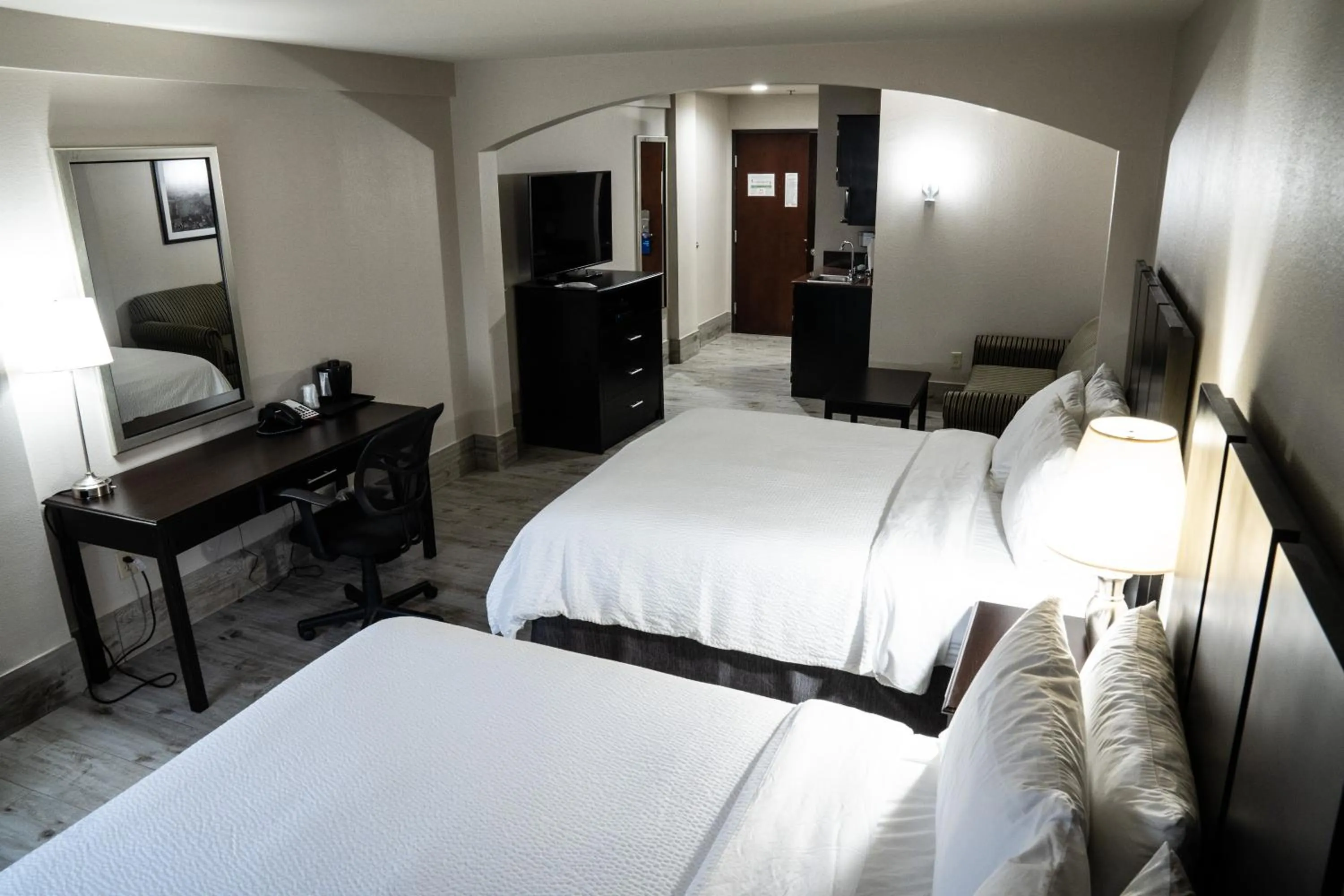 Bed in Lucille's Hotel, Restaurant, & Bar