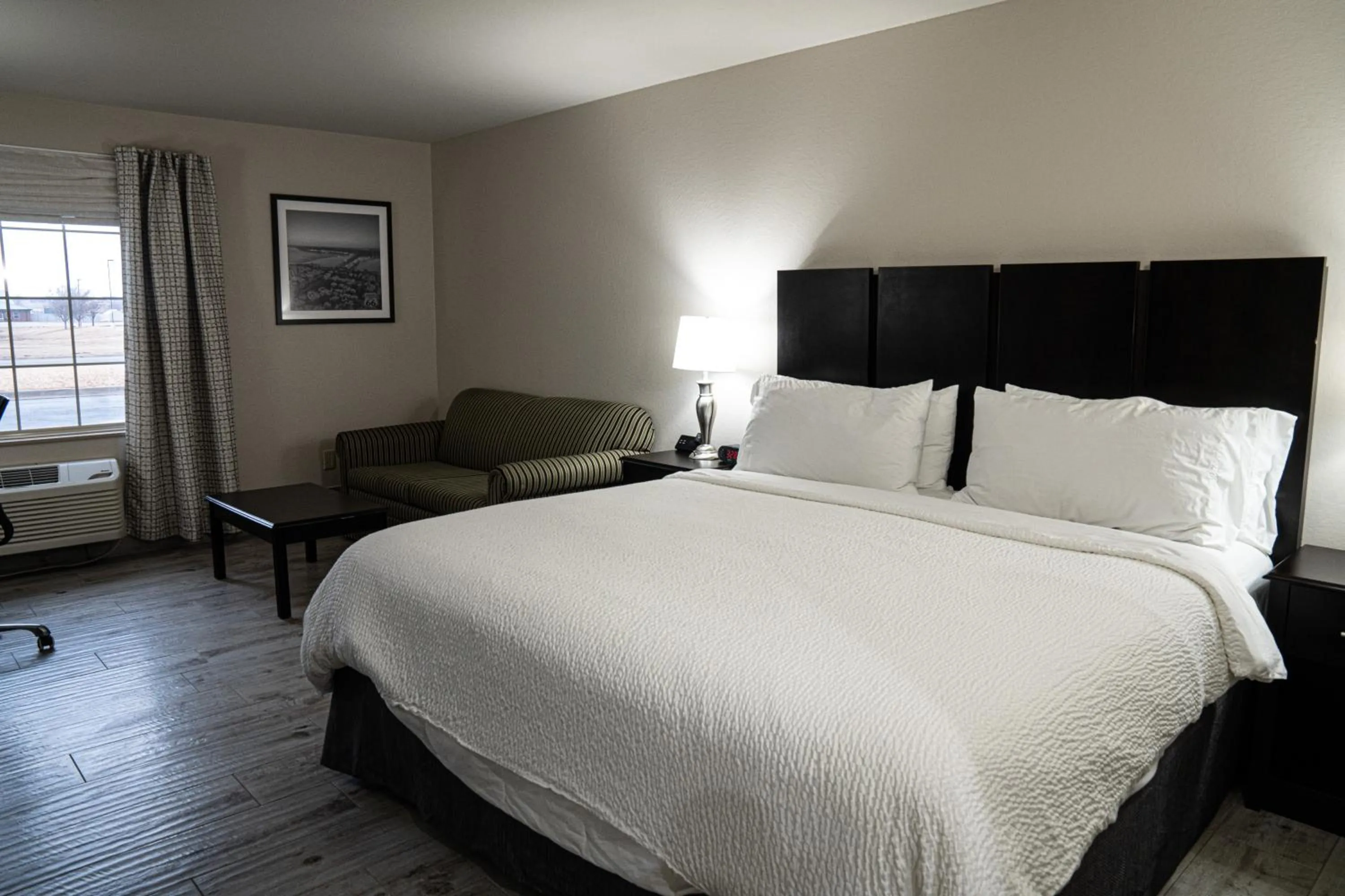 Bed in Lucille's Hotel, Restaurant, & Bar