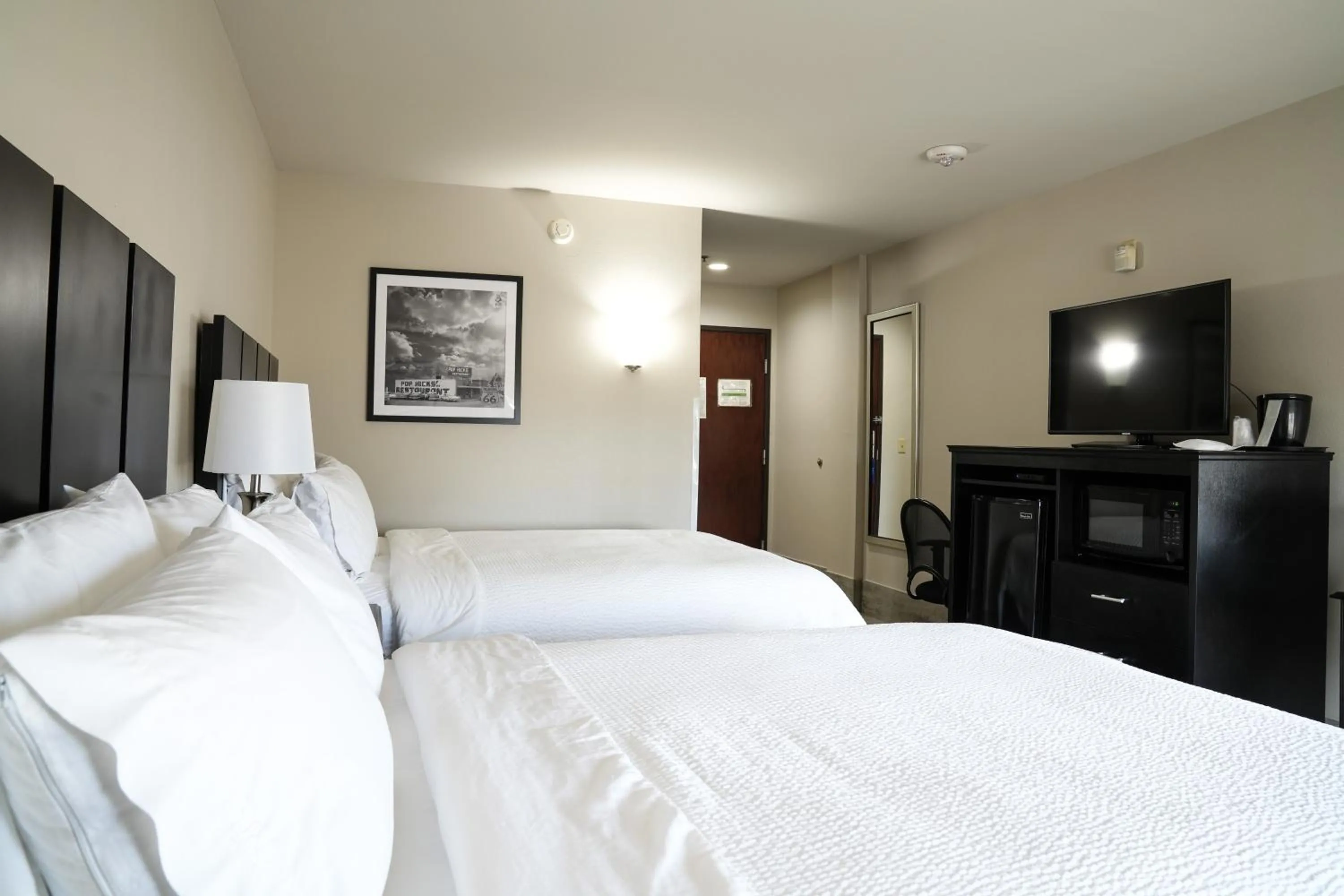 Bed in Lucille's Hotel, Restaurant, & Bar