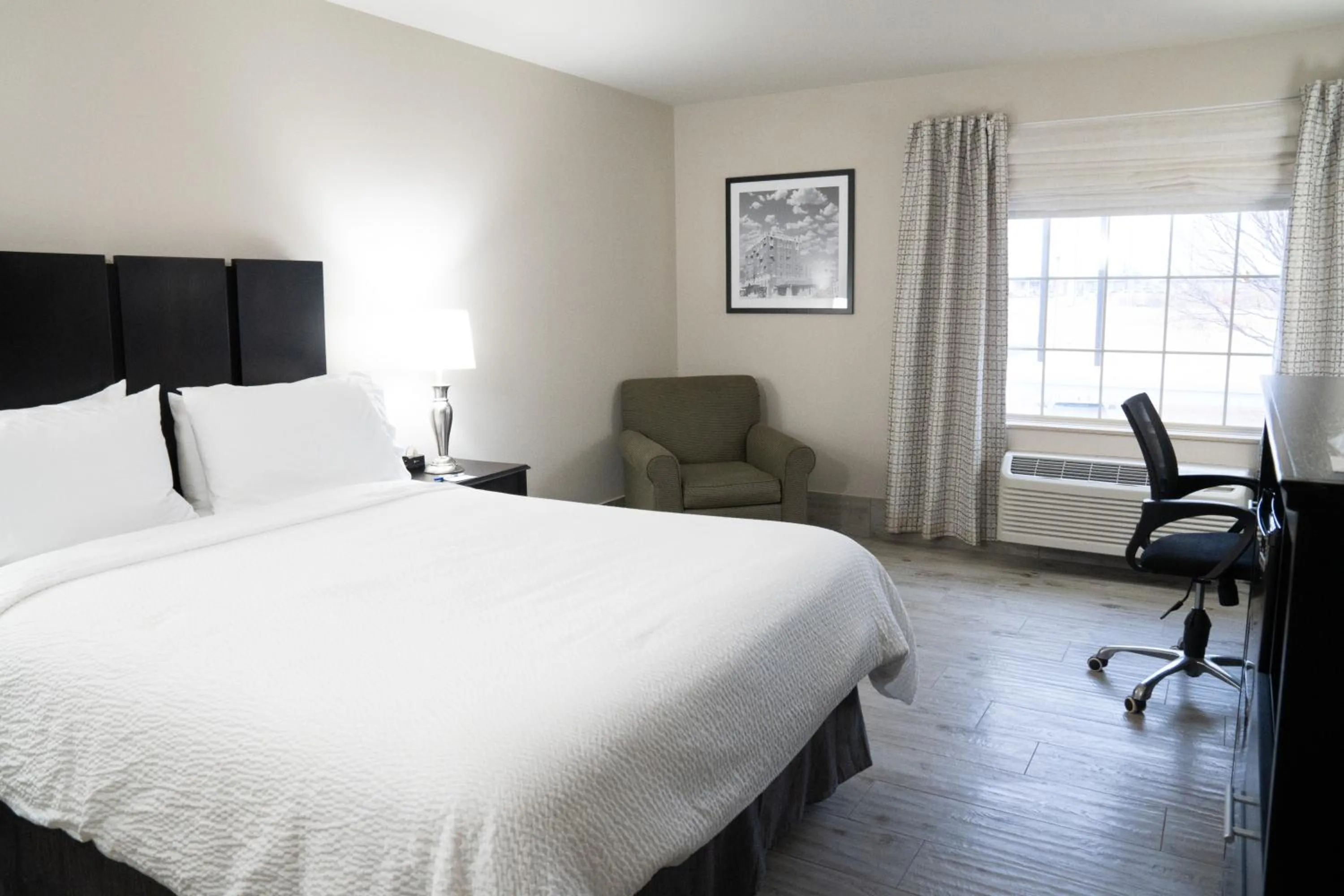 Bed in Lucille's Hotel, Restaurant, & Bar