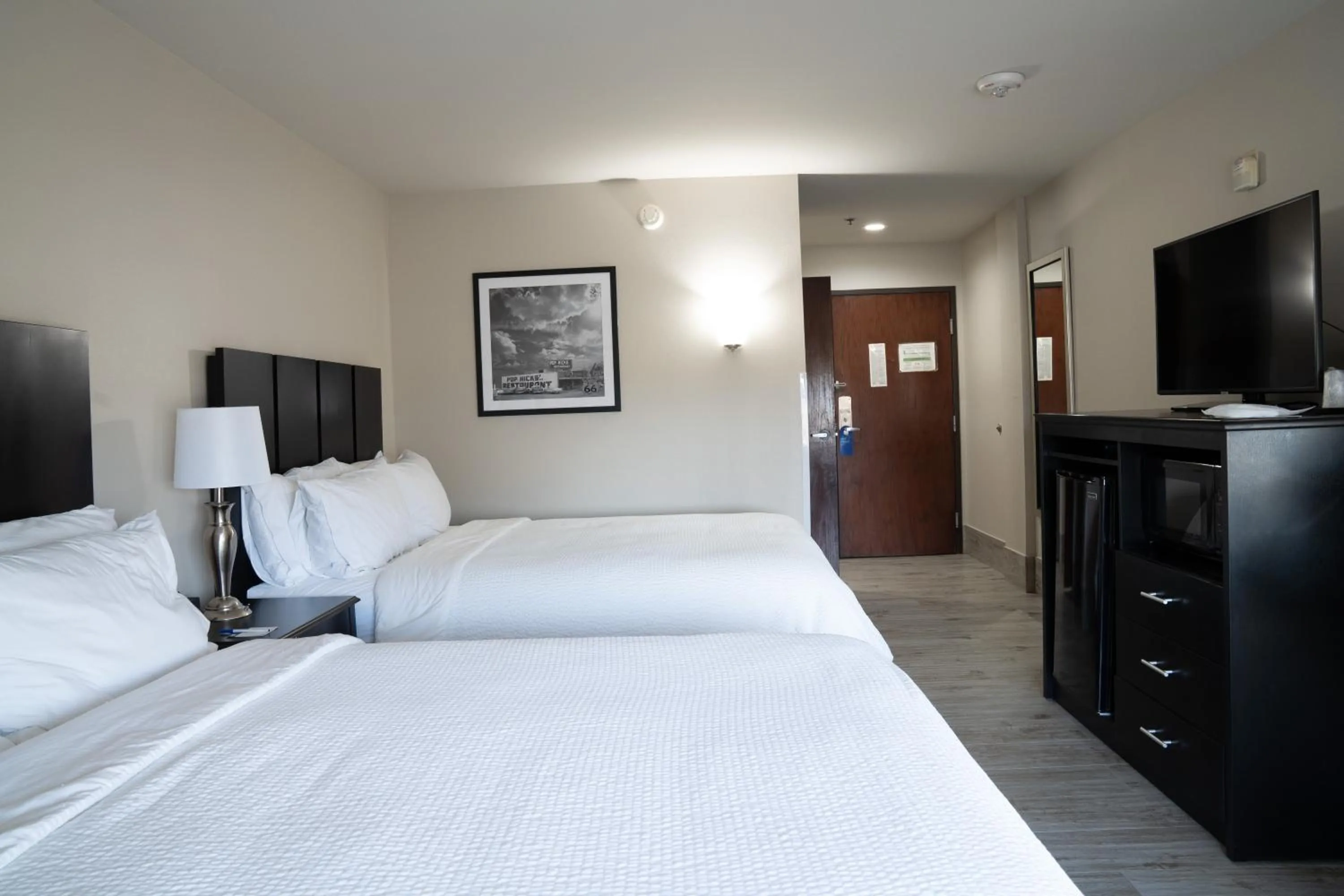 Bed in Lucille's Hotel, Restaurant, & Bar