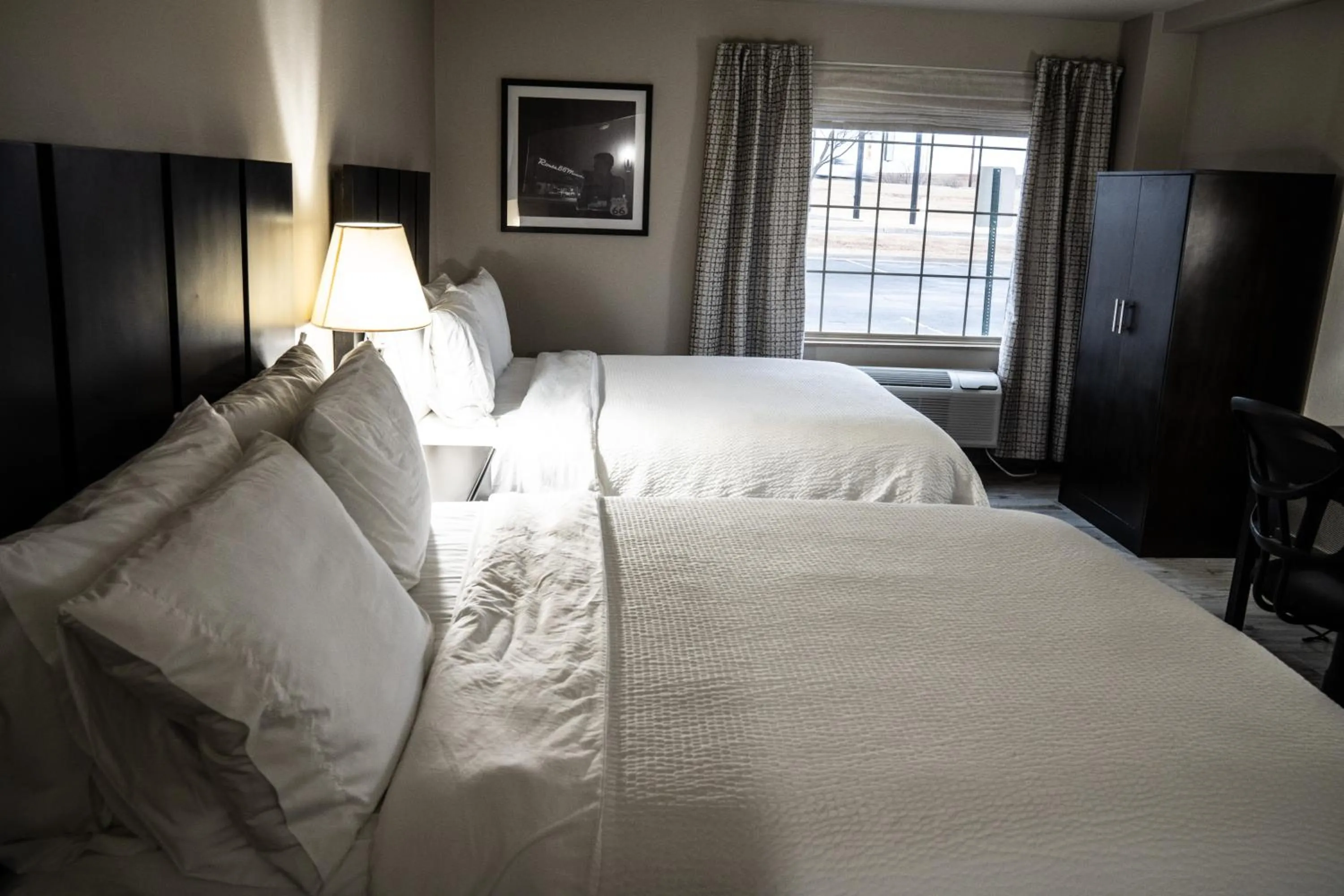 Bed in Lucille's Hotel, Restaurant, & Bar