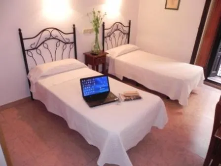 Bed in Hostal Ivor