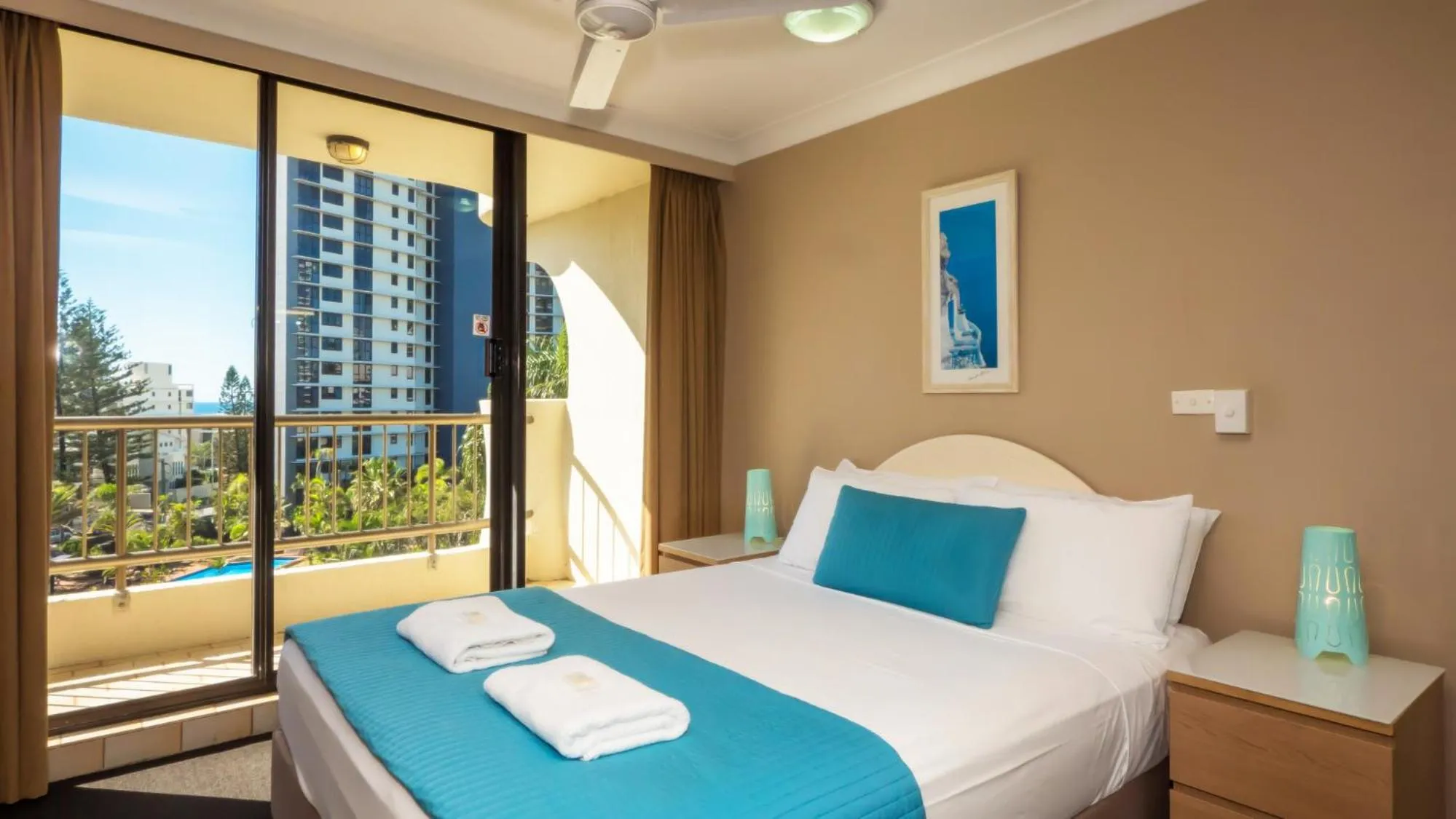 Bed in Aristocrat Apartments