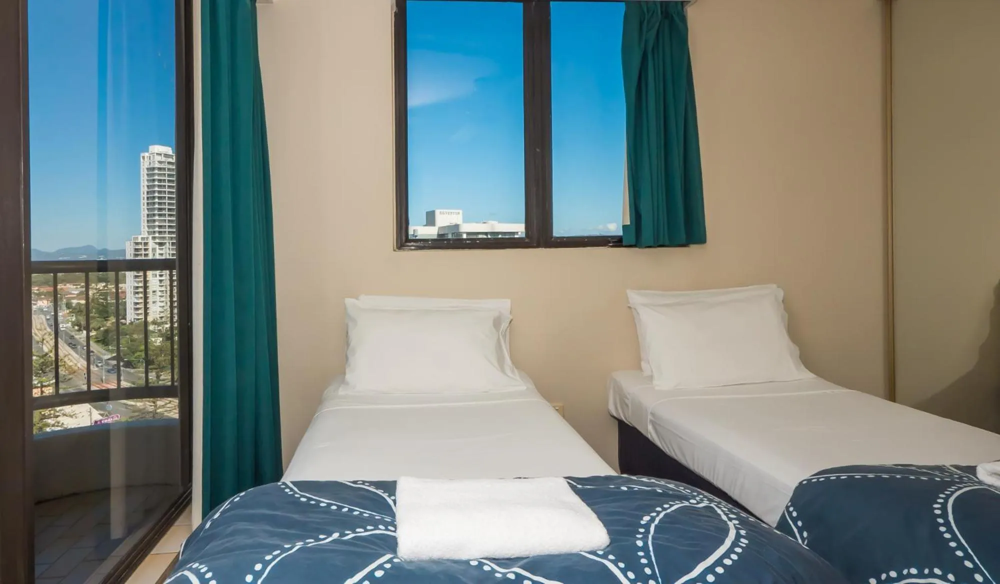 Bed in Aristocrat Apartments