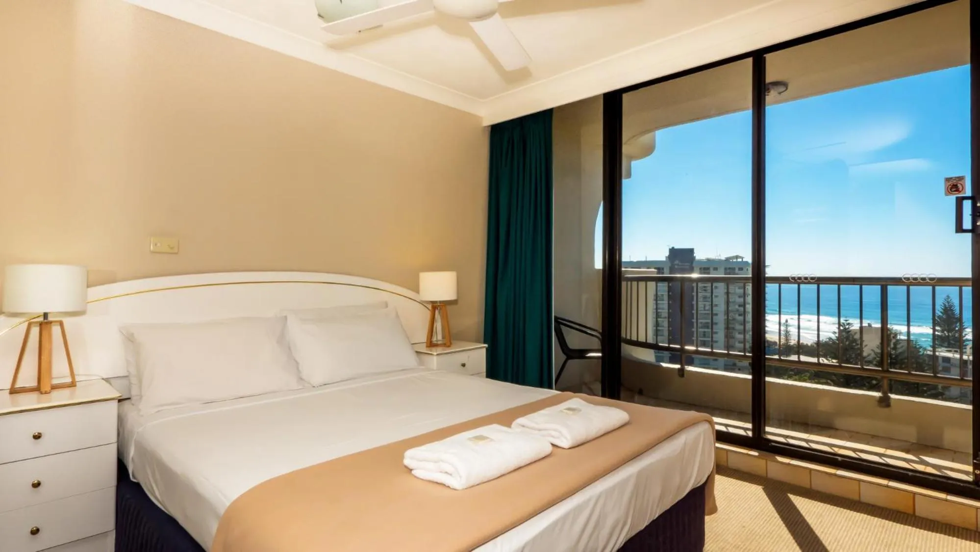 Bed in Aristocrat Apartments