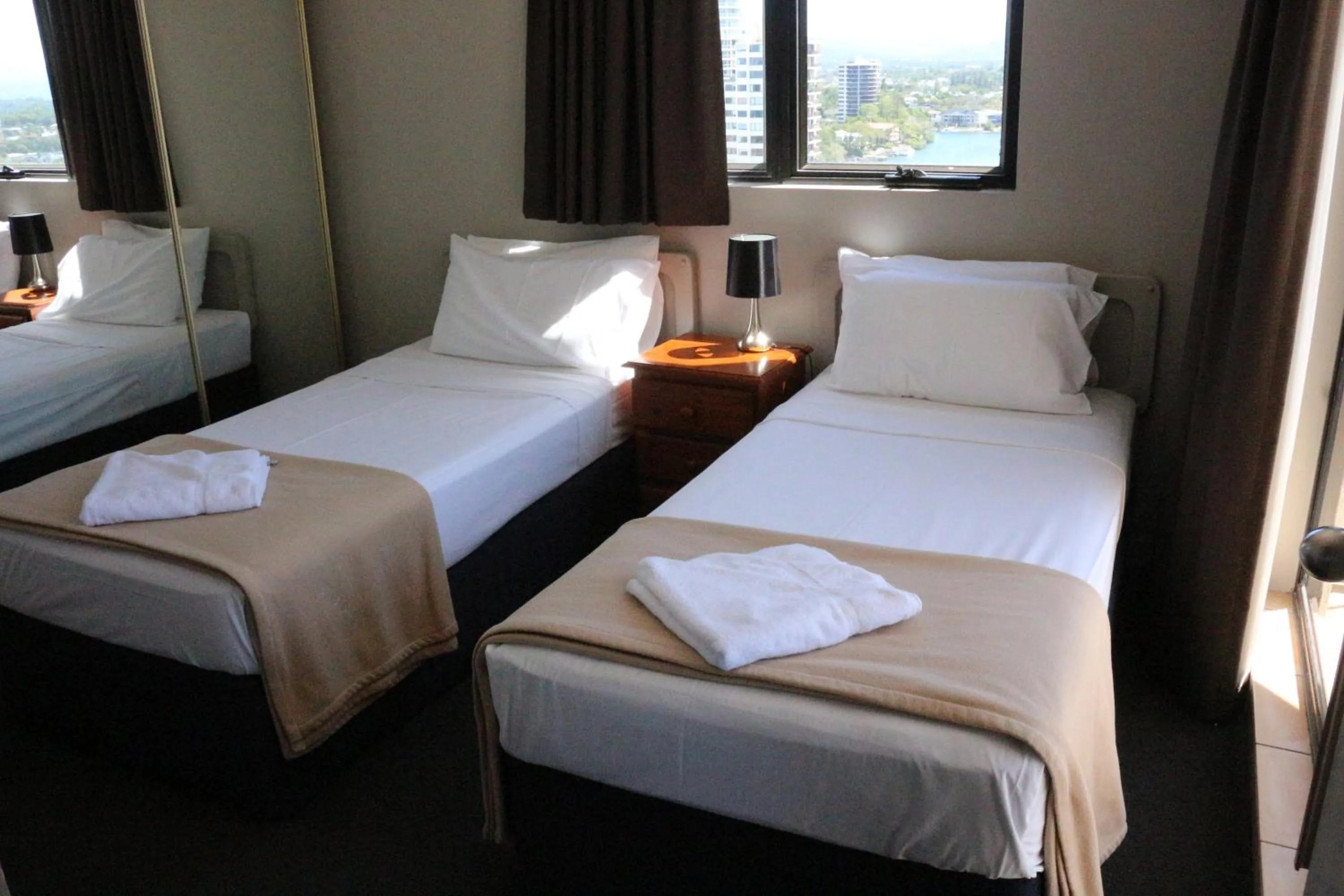 Bed in Aristocrat Apartments