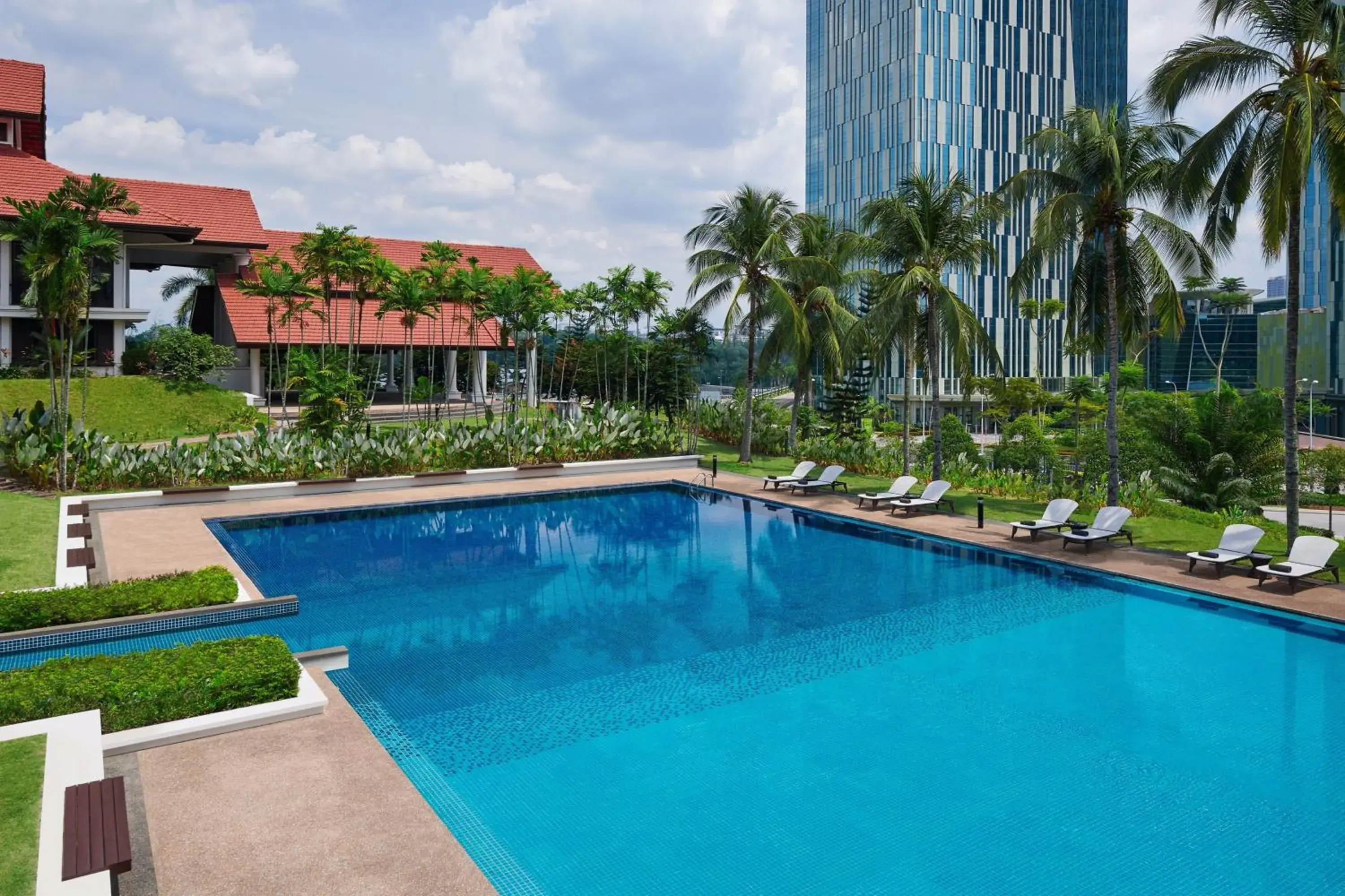 Swimming pool in Palm Garden Hotel, Putrajaya, a Tribute Portfolio Hotel Swimming pool in Palm Garden Hotel, Putrajaya, a Tribute Portfolio Hotel