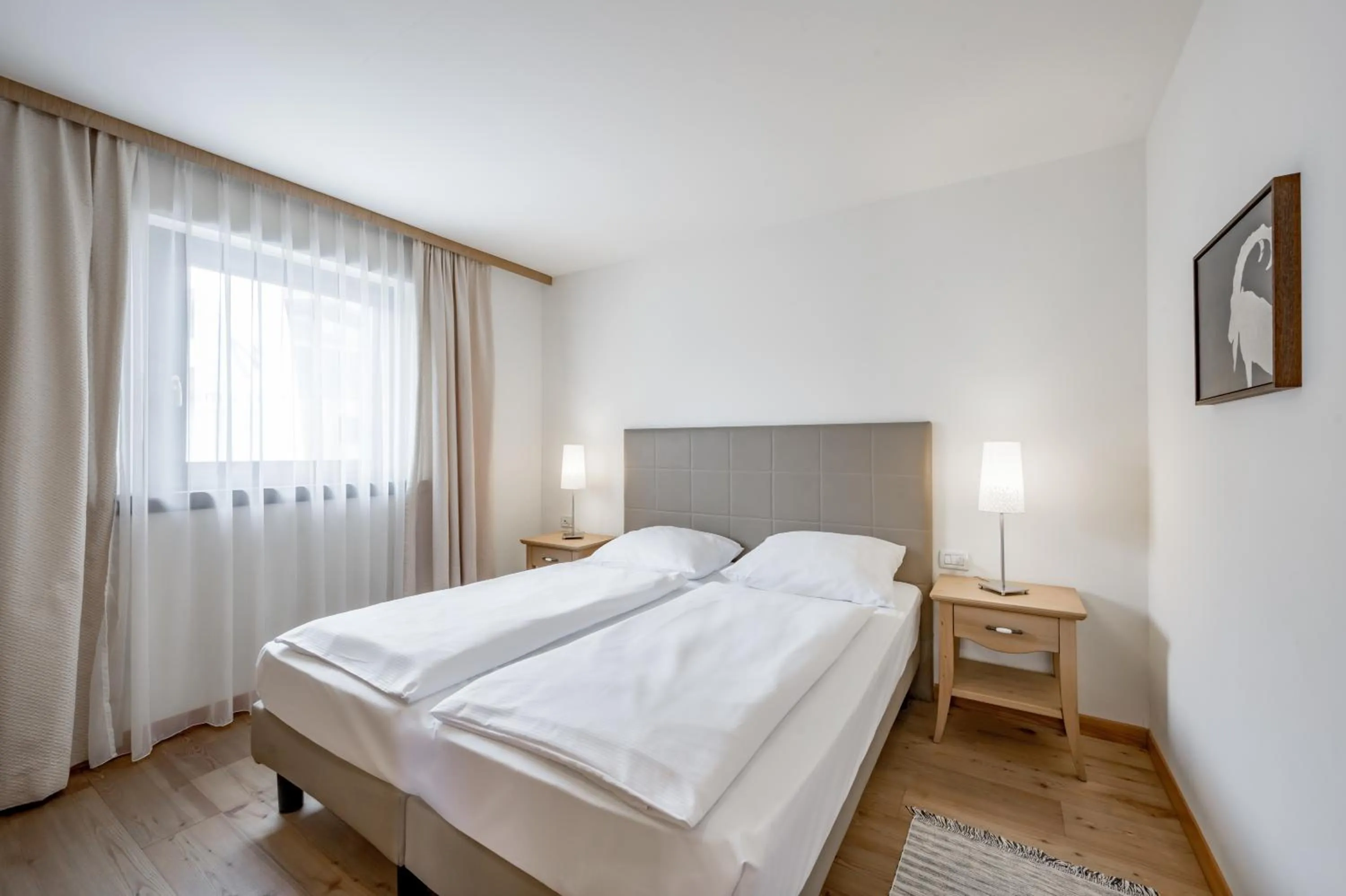 Bed in Apartment Torri di Seefeld