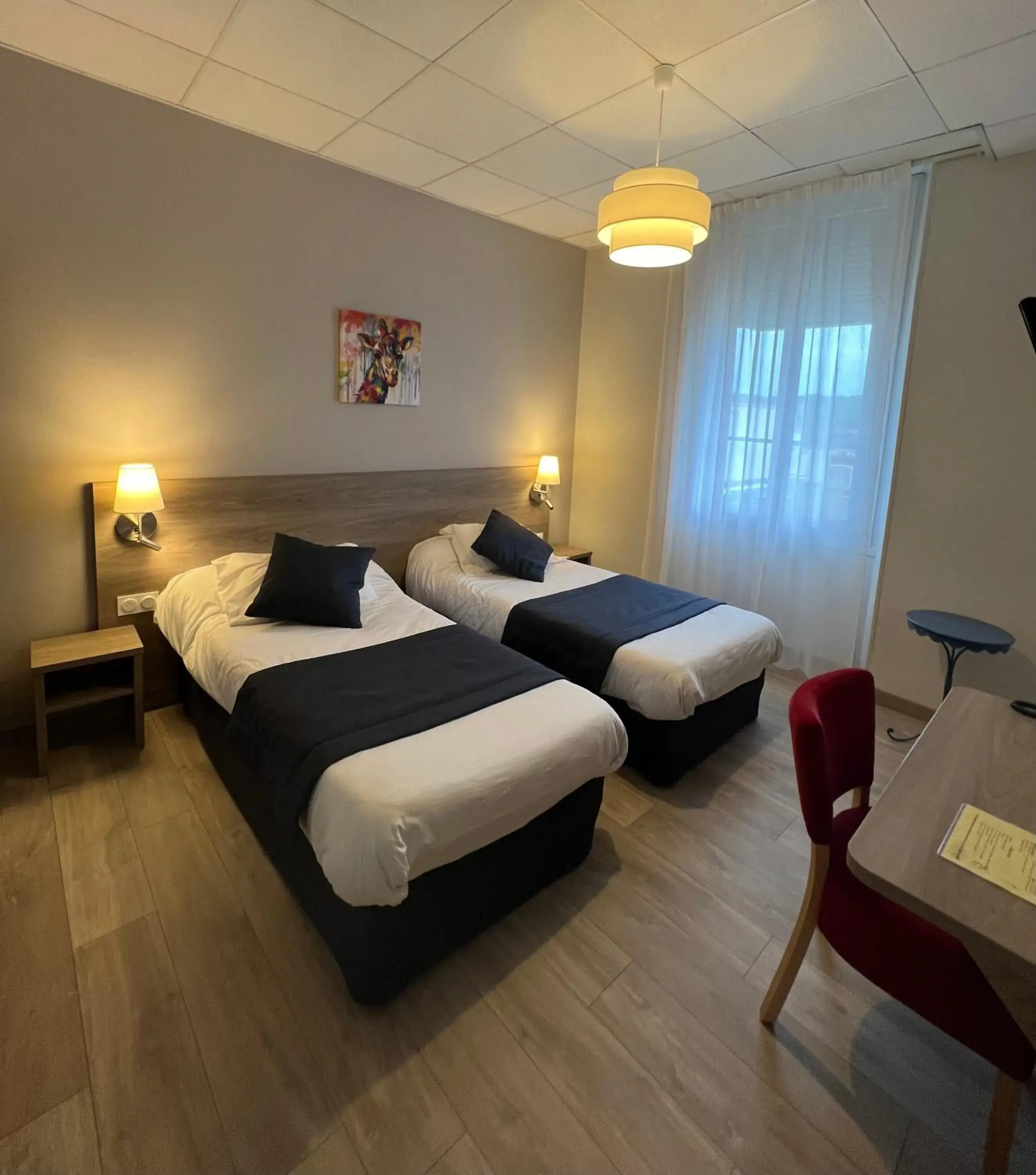 Twin Room - single occupancy in Hôtel Le Roi Gourmand Twin Room - single occupancy in Hôtel Le Roi Gourmand