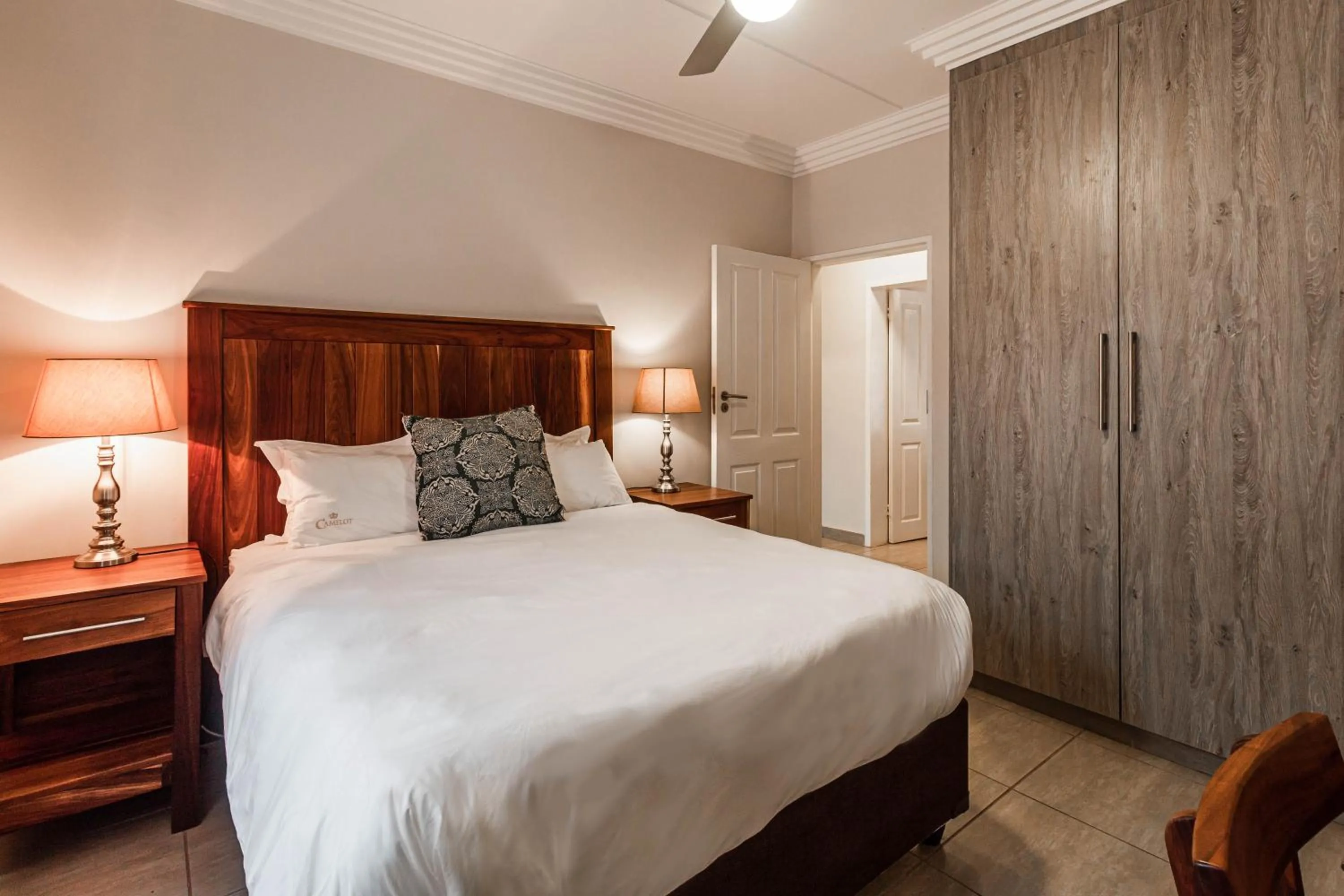 Bedroom, Bed in Camelot Guest House & Apartments