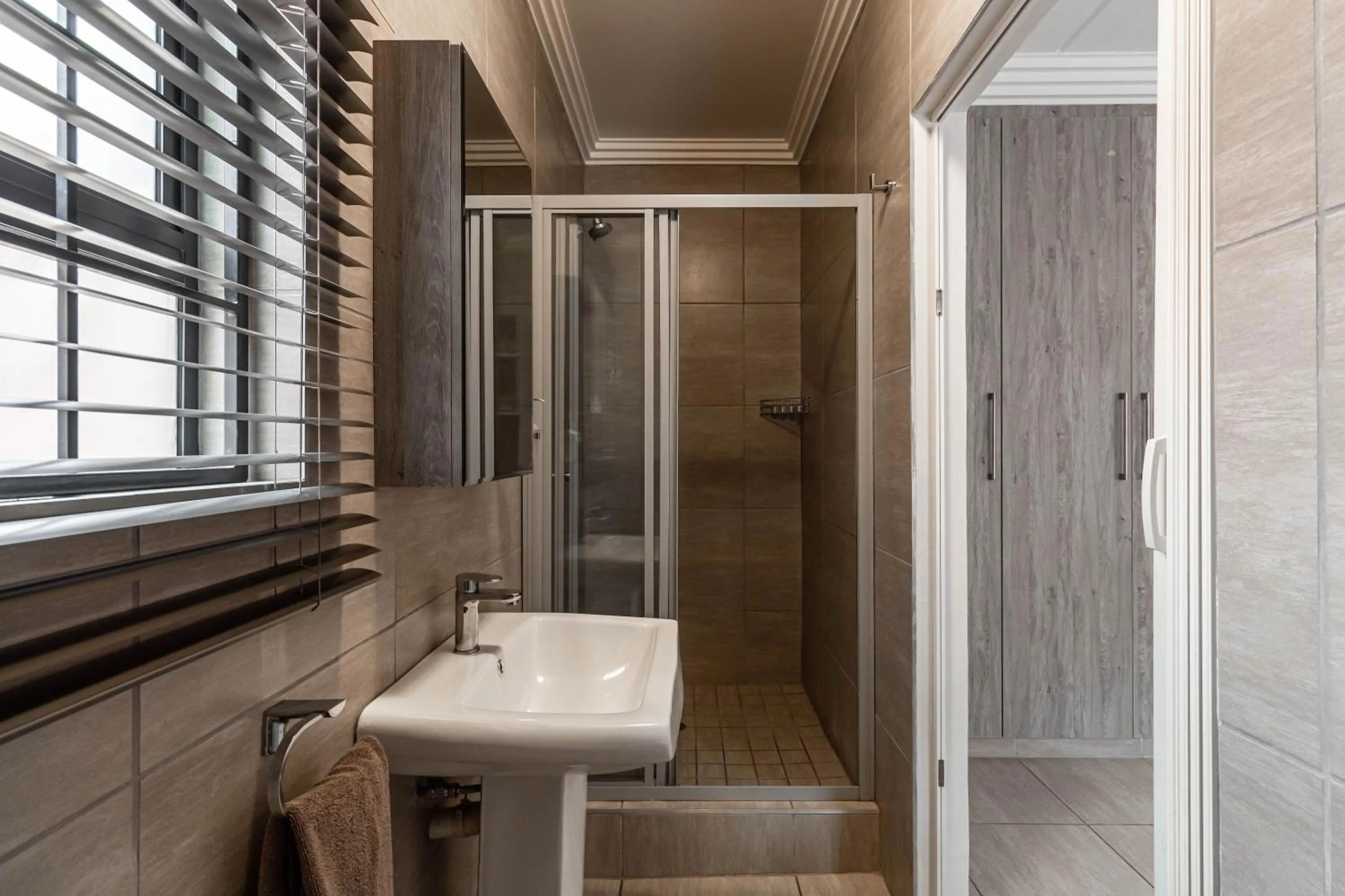 Bathroom in Camelot Guest House & Apartments