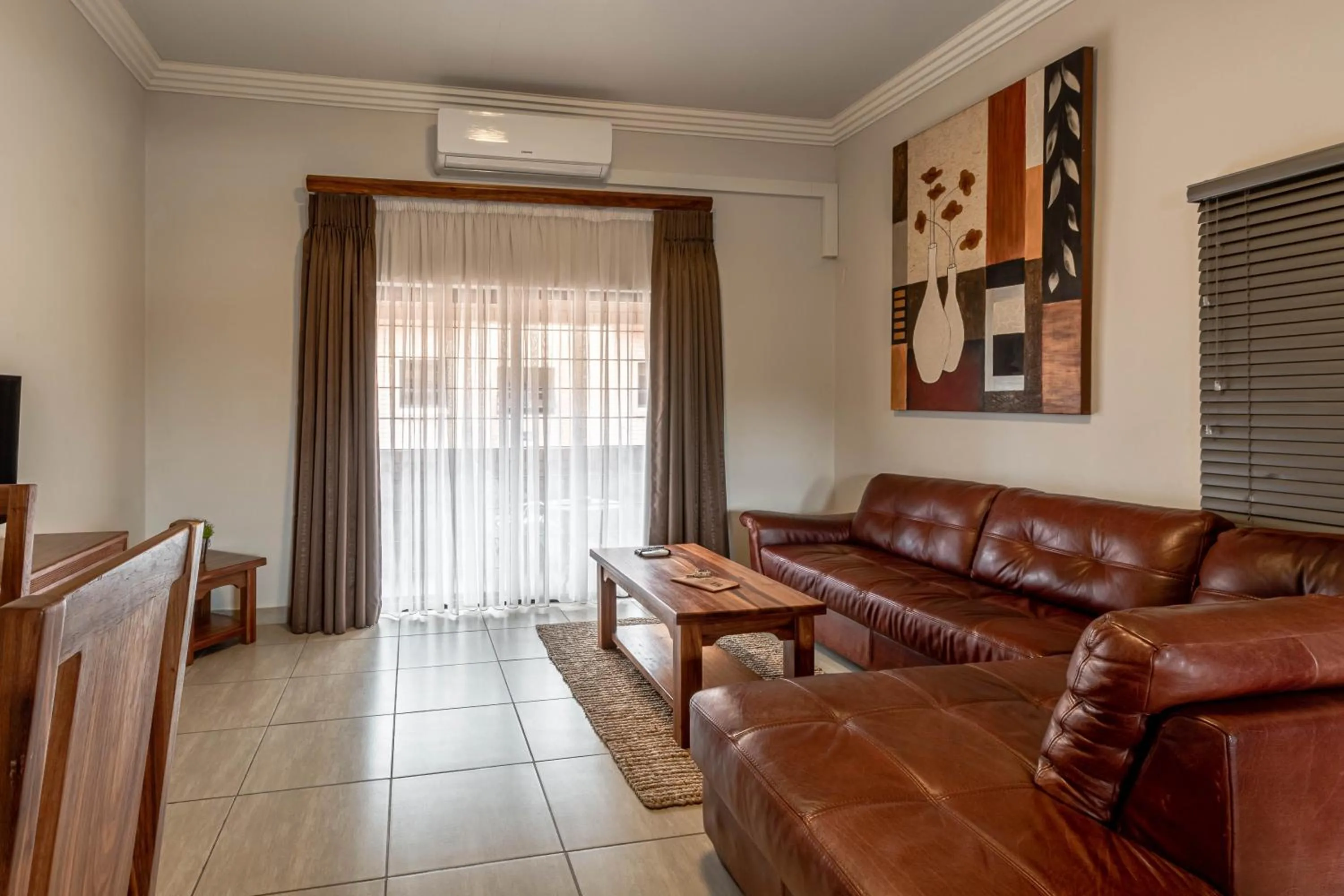 Photo of the whole room in Camelot Guest House & Apartments