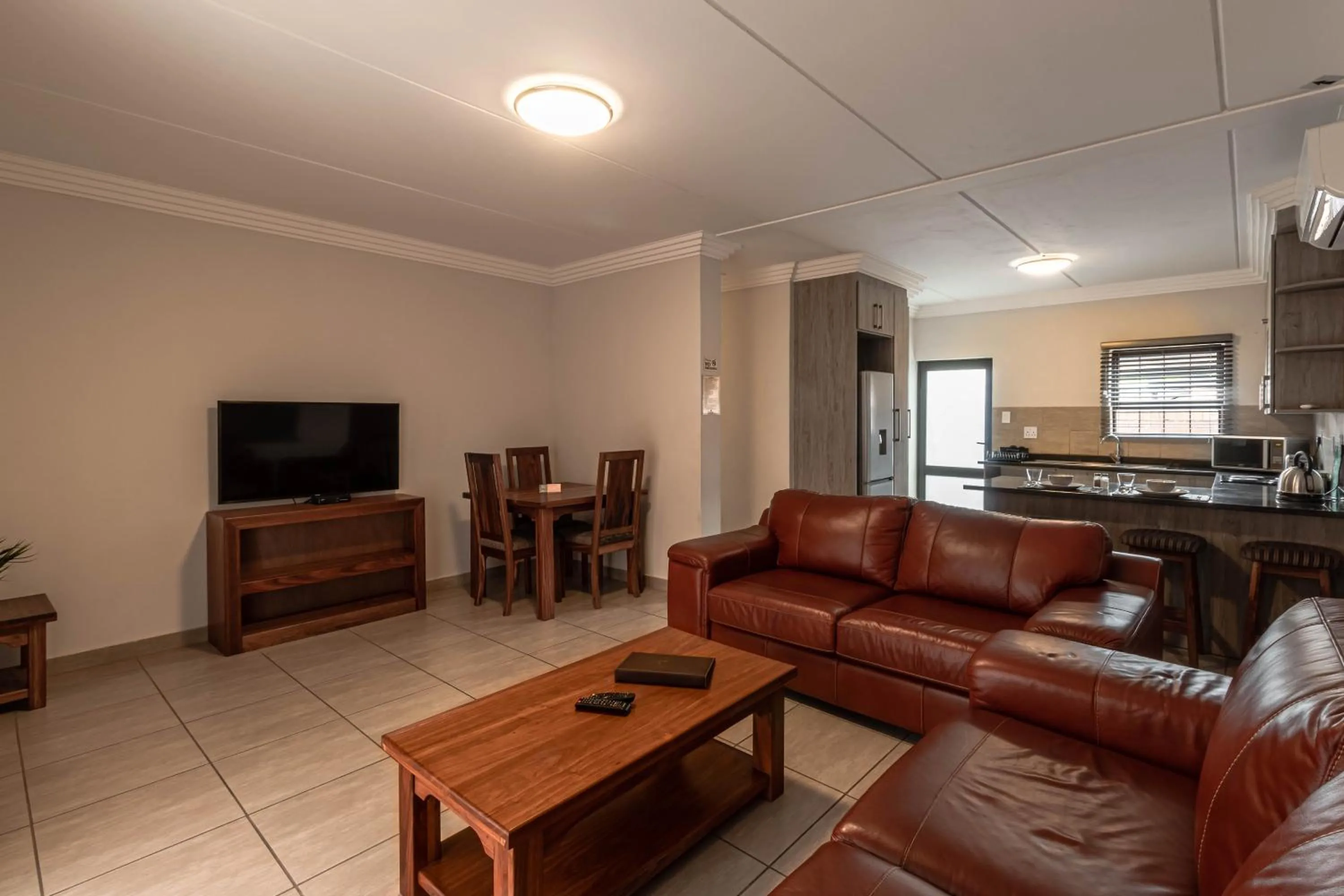 Photo of the whole room in Camelot Guest House & Apartments