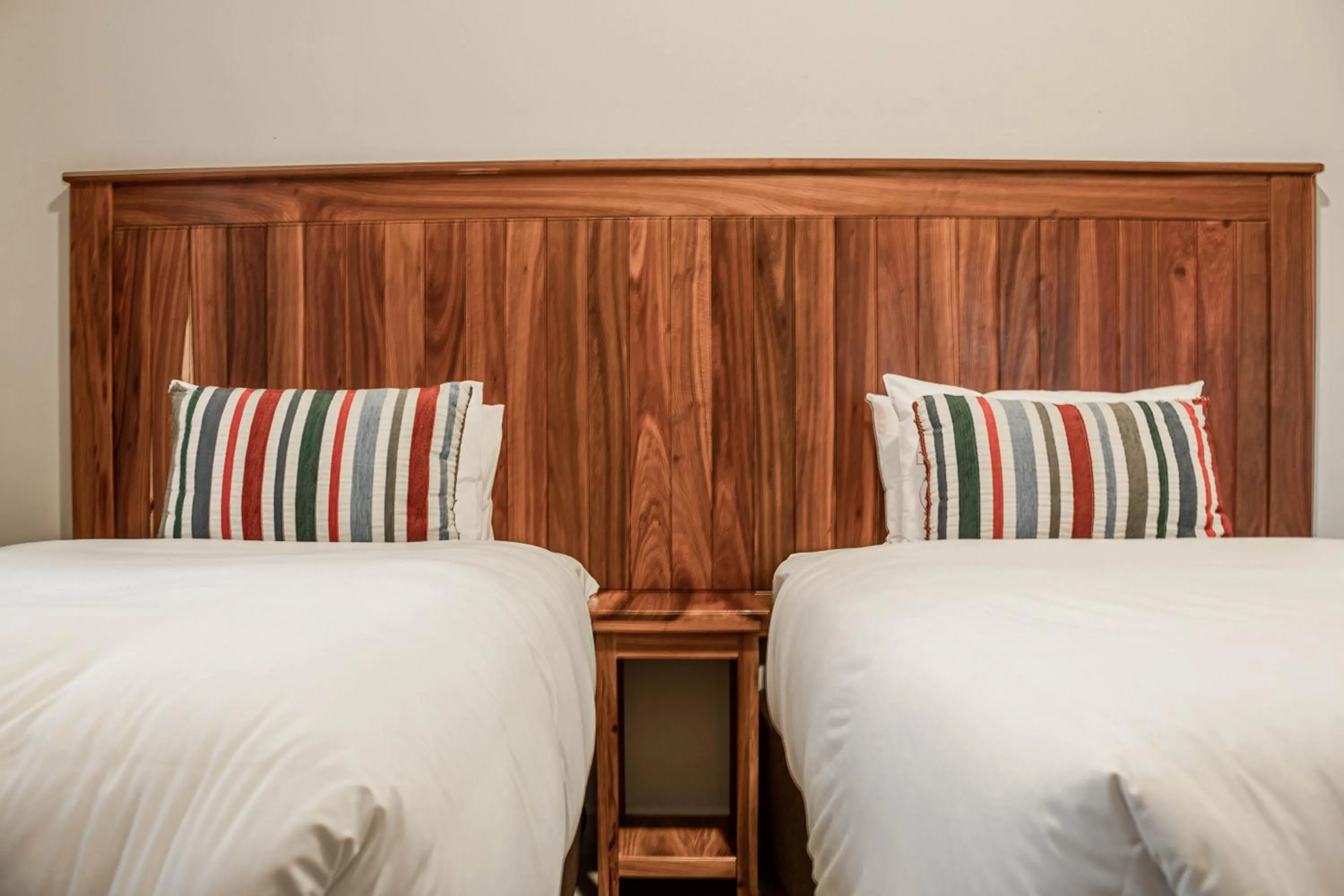 Bed in Camelot Guest House & Apartments
