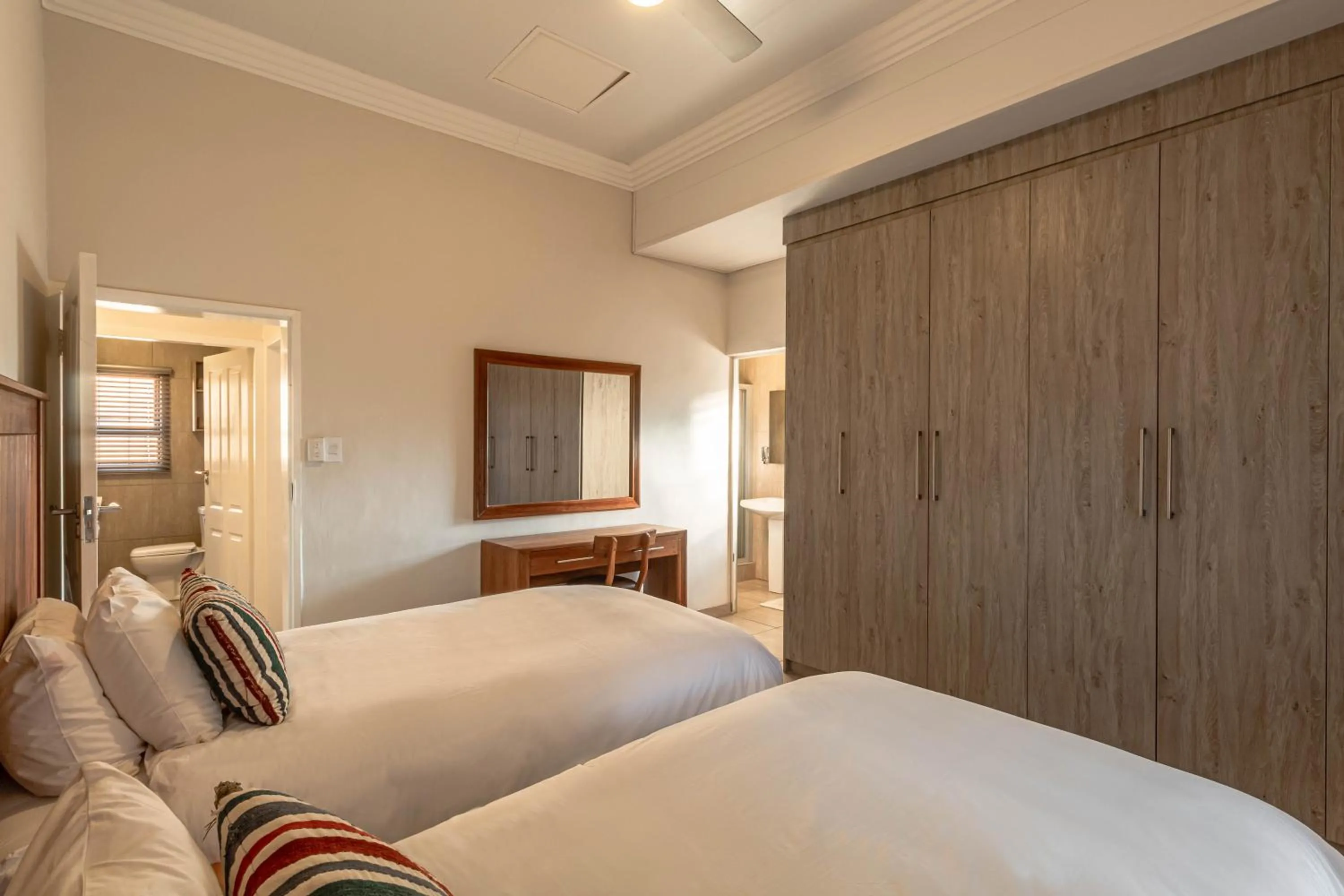 Bedroom, Bed in Camelot Guest House & Apartments
