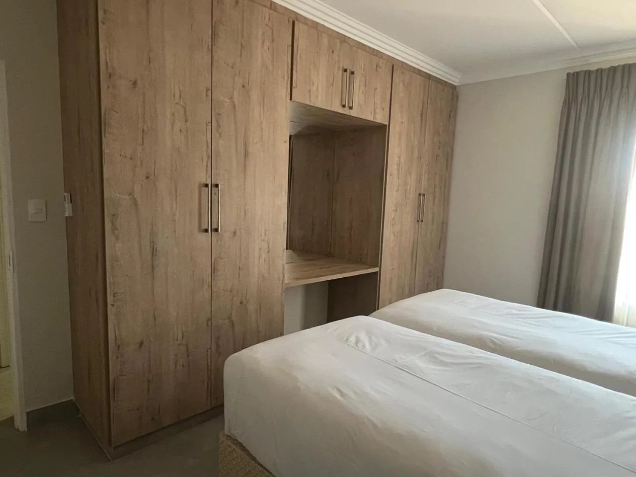 Bed in Camelot Guest House & Apartments