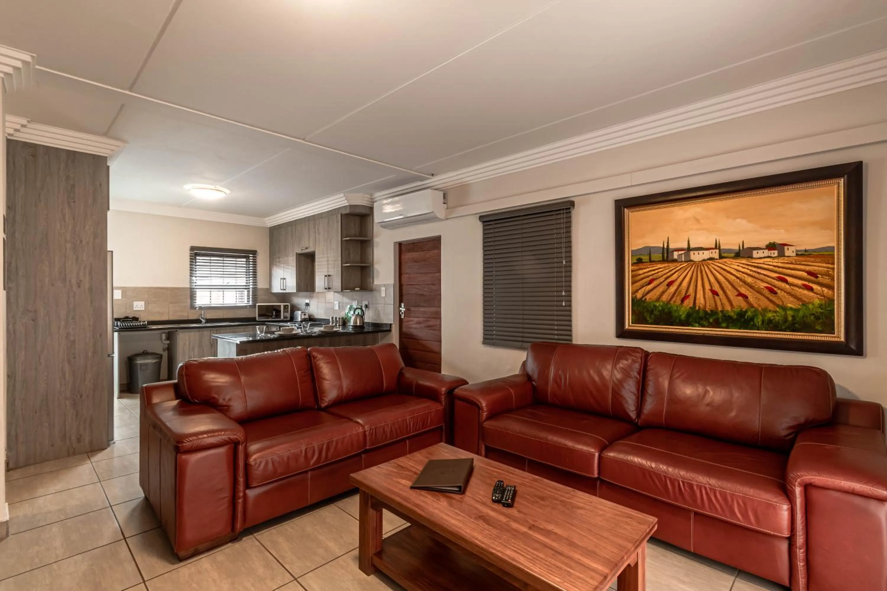 Living room in Camelot Guest House & Apartments