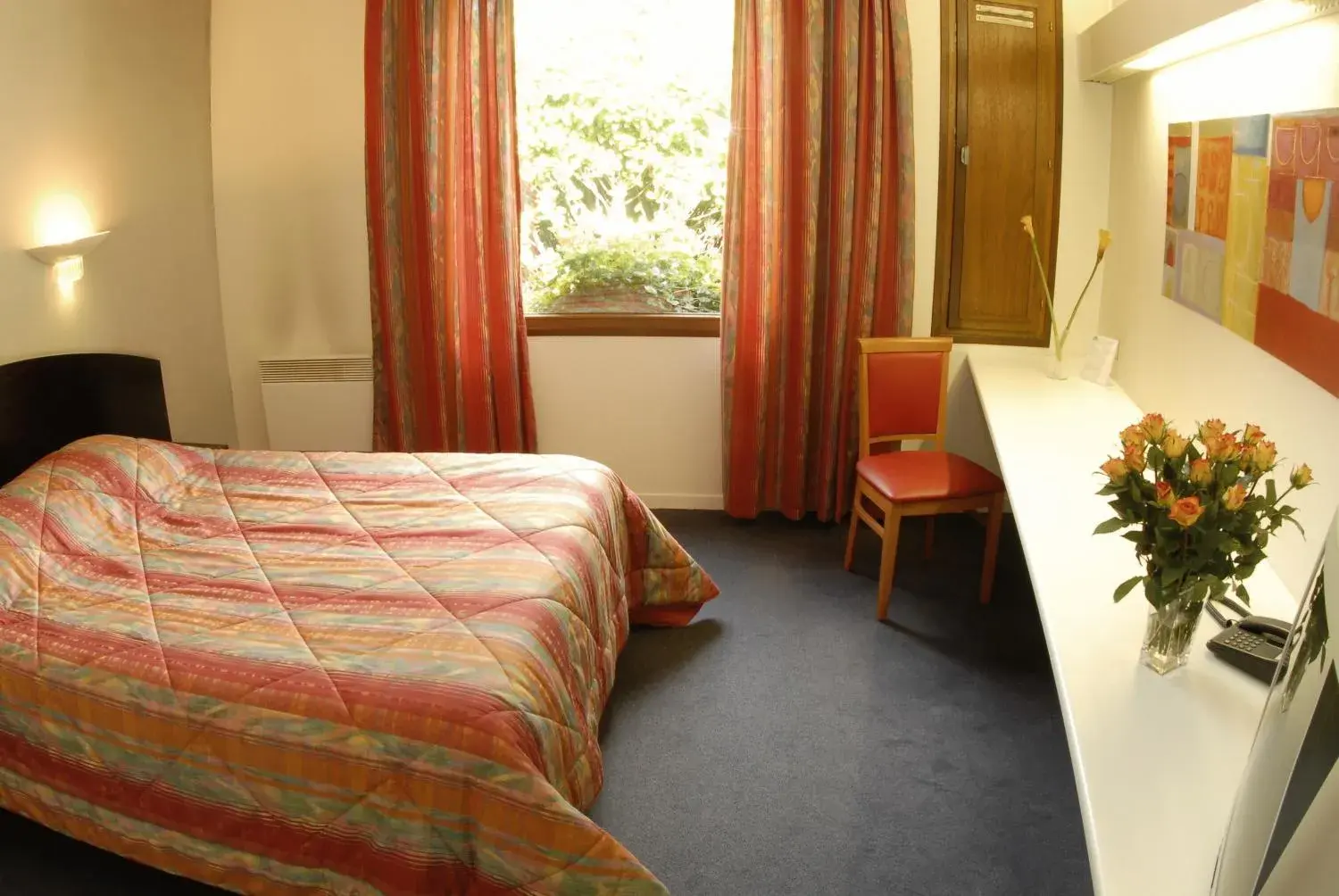 Photo of the whole room, Bed in Hôtel Agena Photo of the whole room, Bed in Hôtel Agena