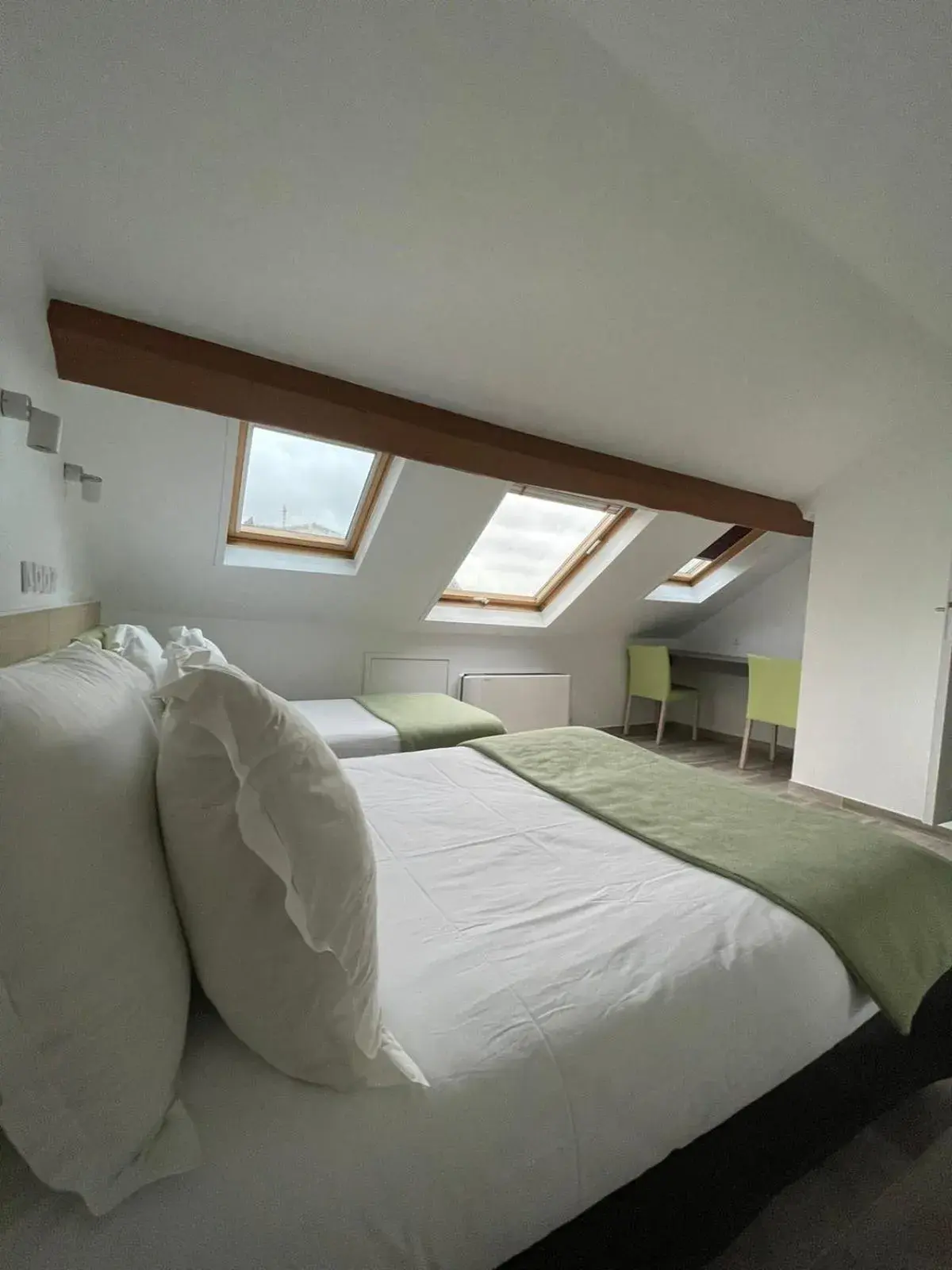 Bed in Hôtel De La Herse d'Or Bed in Hôtel De La Herse d'Or