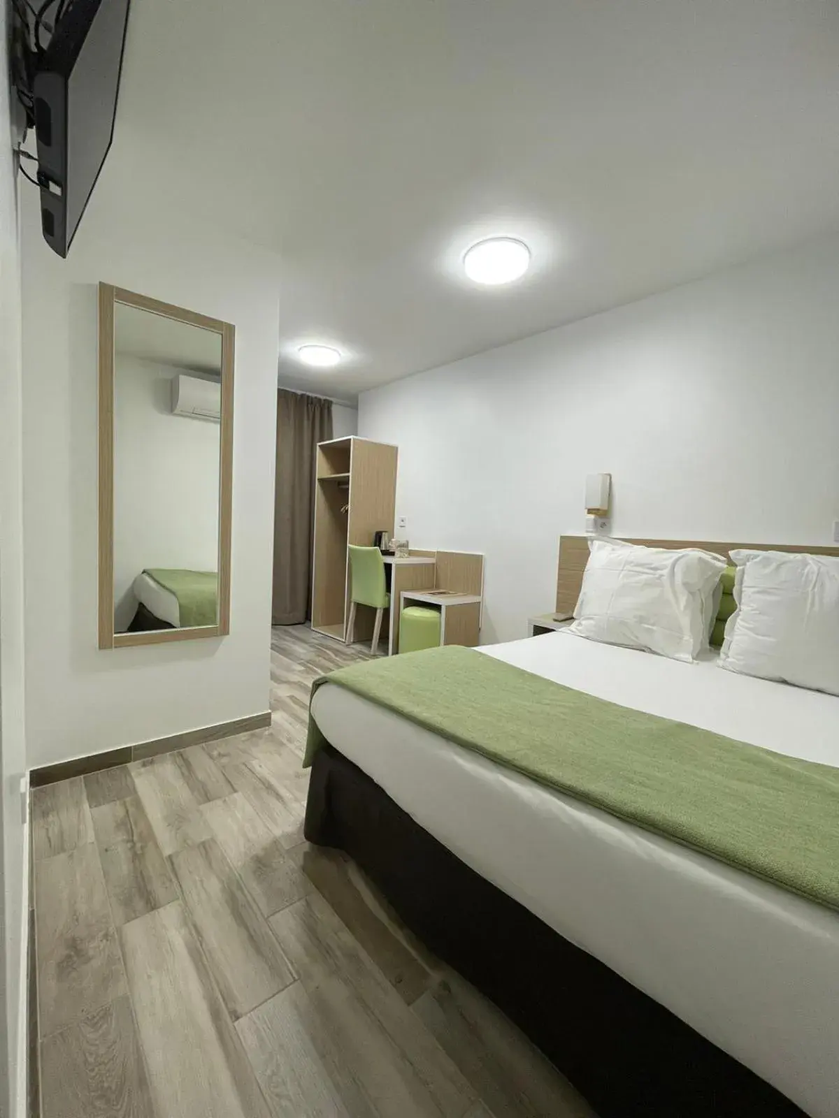 Bed in Hôtel De La Herse d'Or Bed in Hôtel De La Herse d'Or