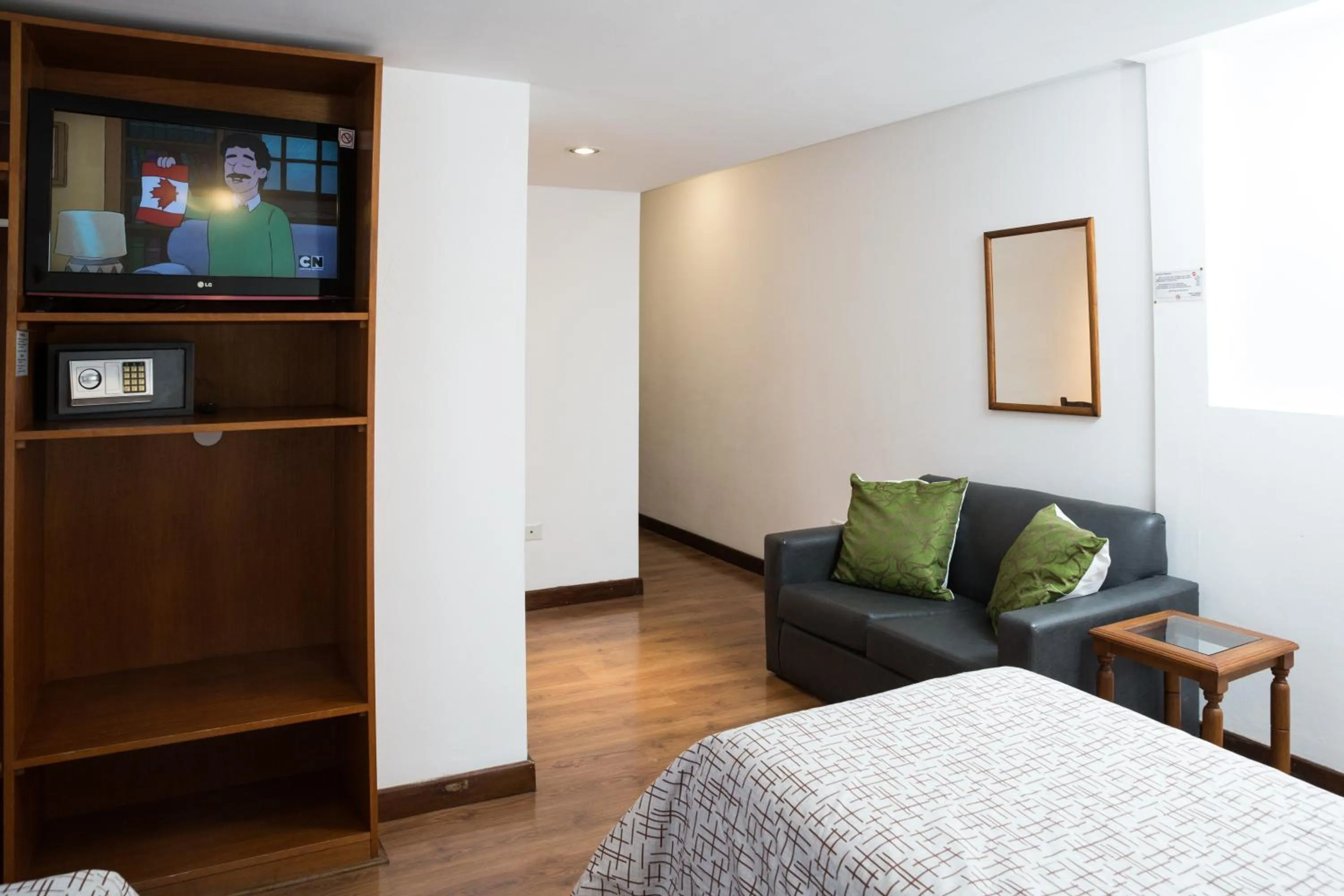 Bed in NBH Premier Hotel