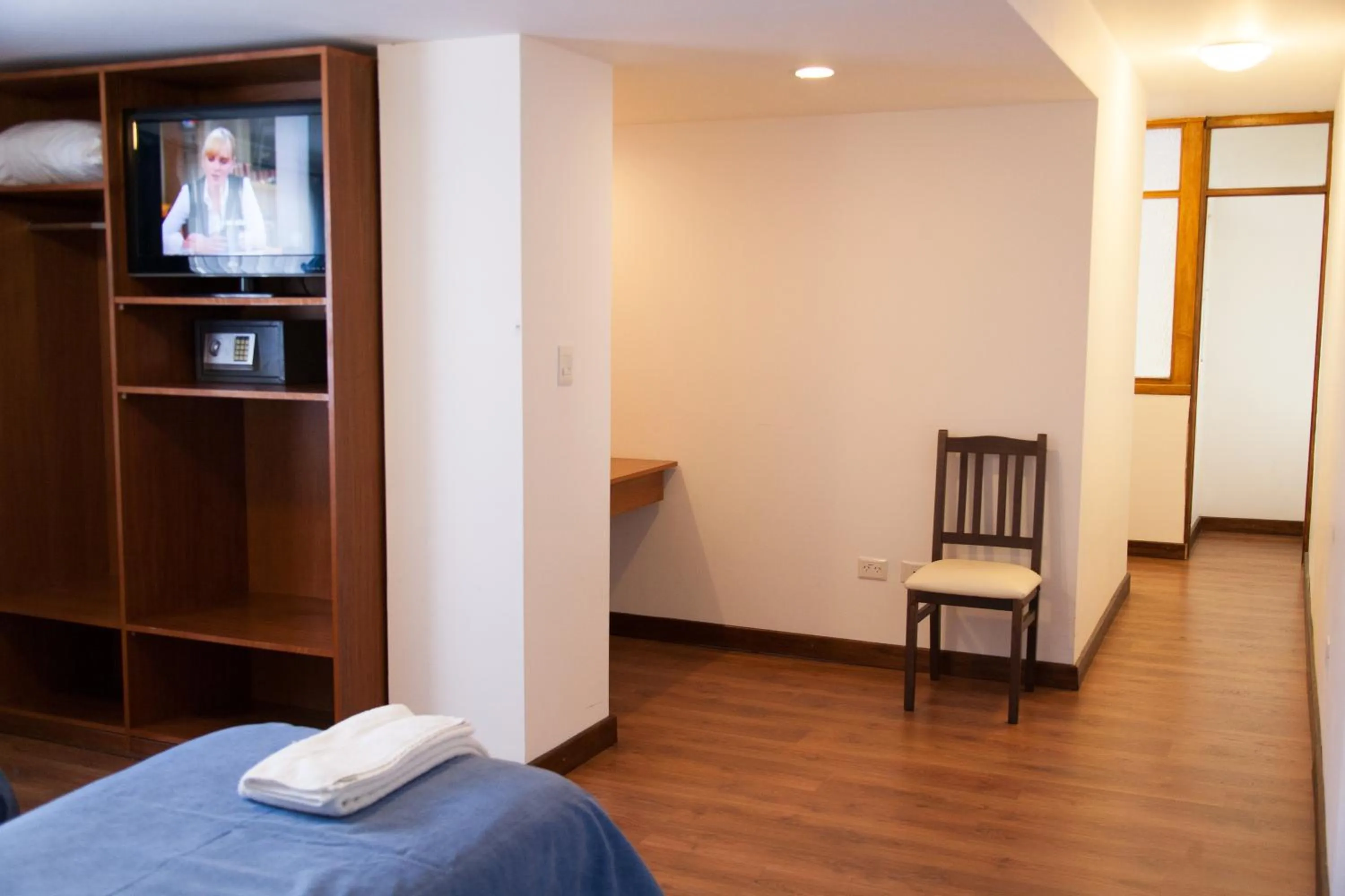 Bed in NBH Premier Hotel