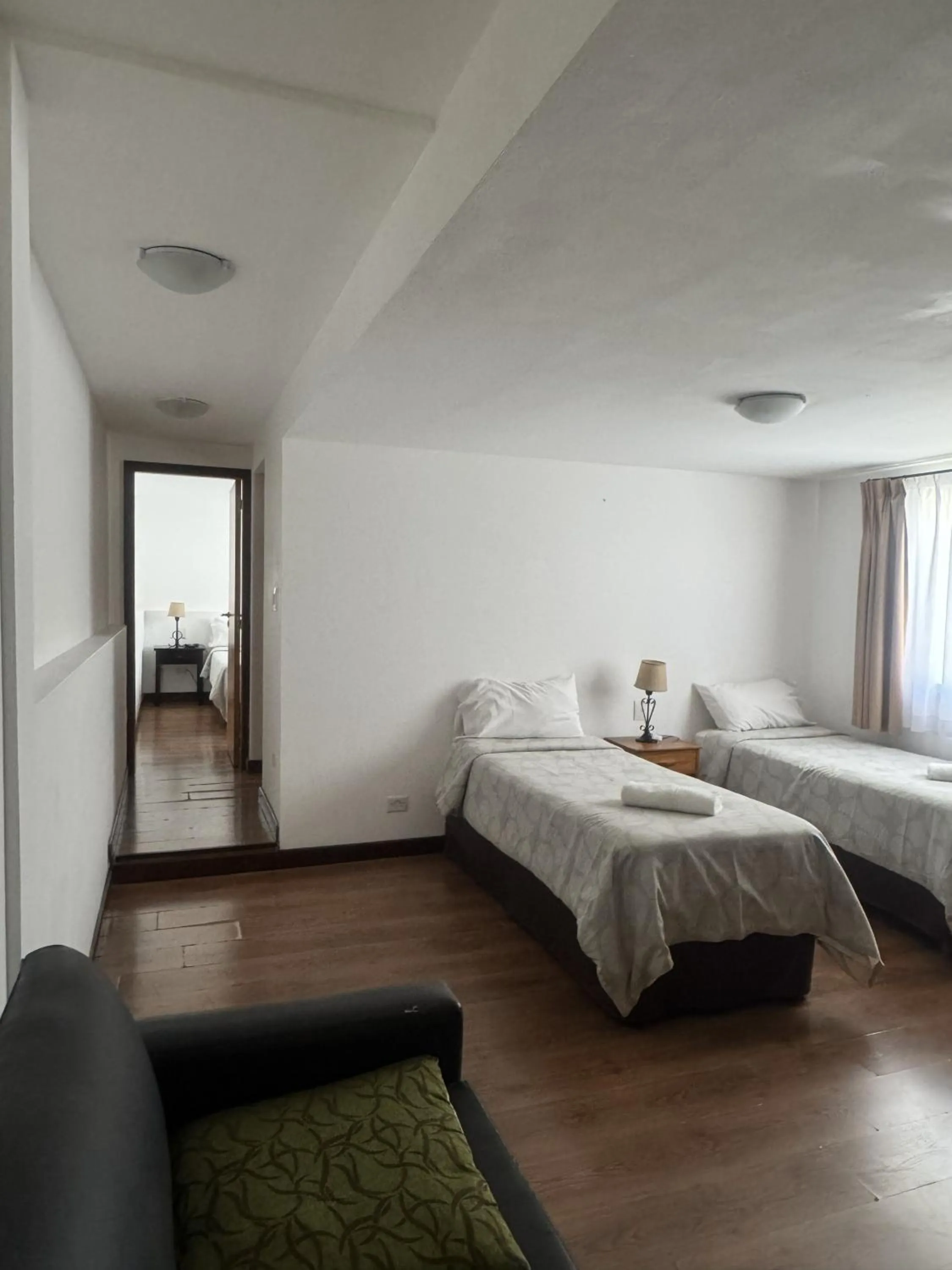 Bed in NBH Premier Hotel