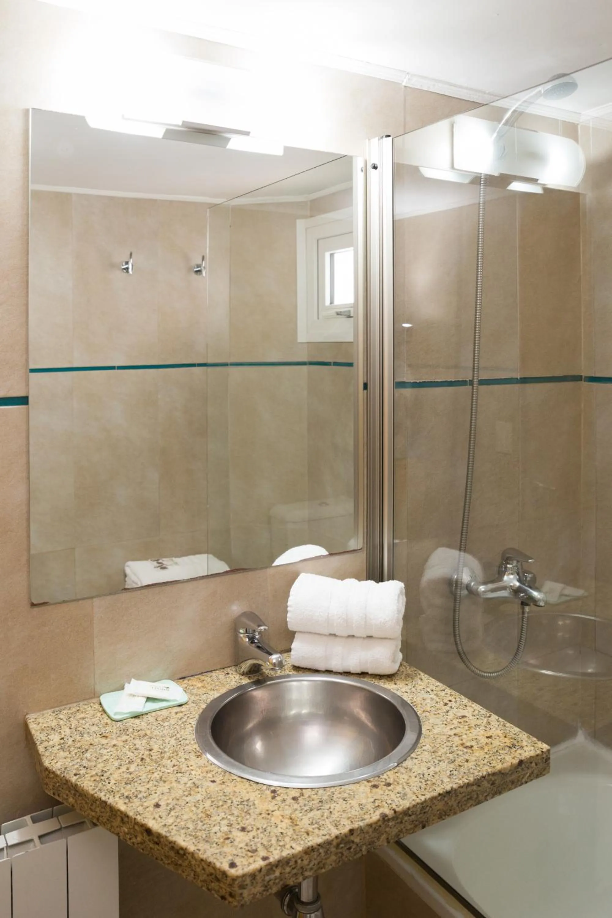 Shower in NBH Premier Hotel