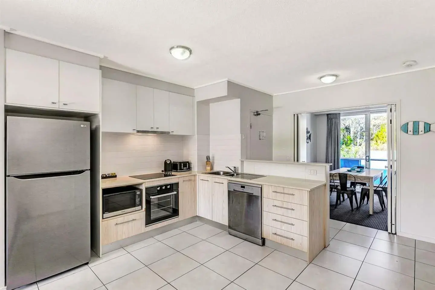 Kitchen or kitchenette in Ramada Encore by Wyndham Whale Cove Kitchen or kitchenette in Ramada Encore by Wyndham Whale Cove