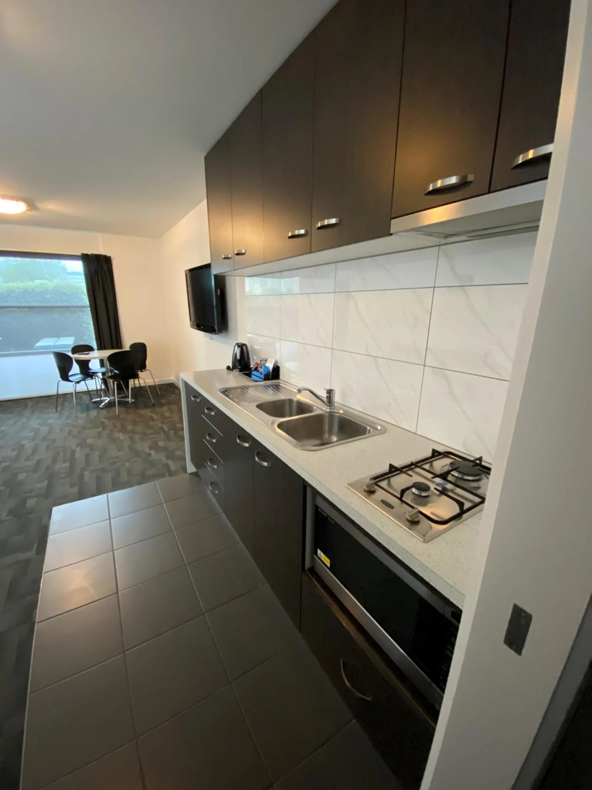 Kitchen or kitchenette in Brighton Hotel Motel