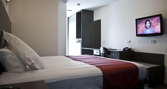 Bed in Brighton Hotel Motel