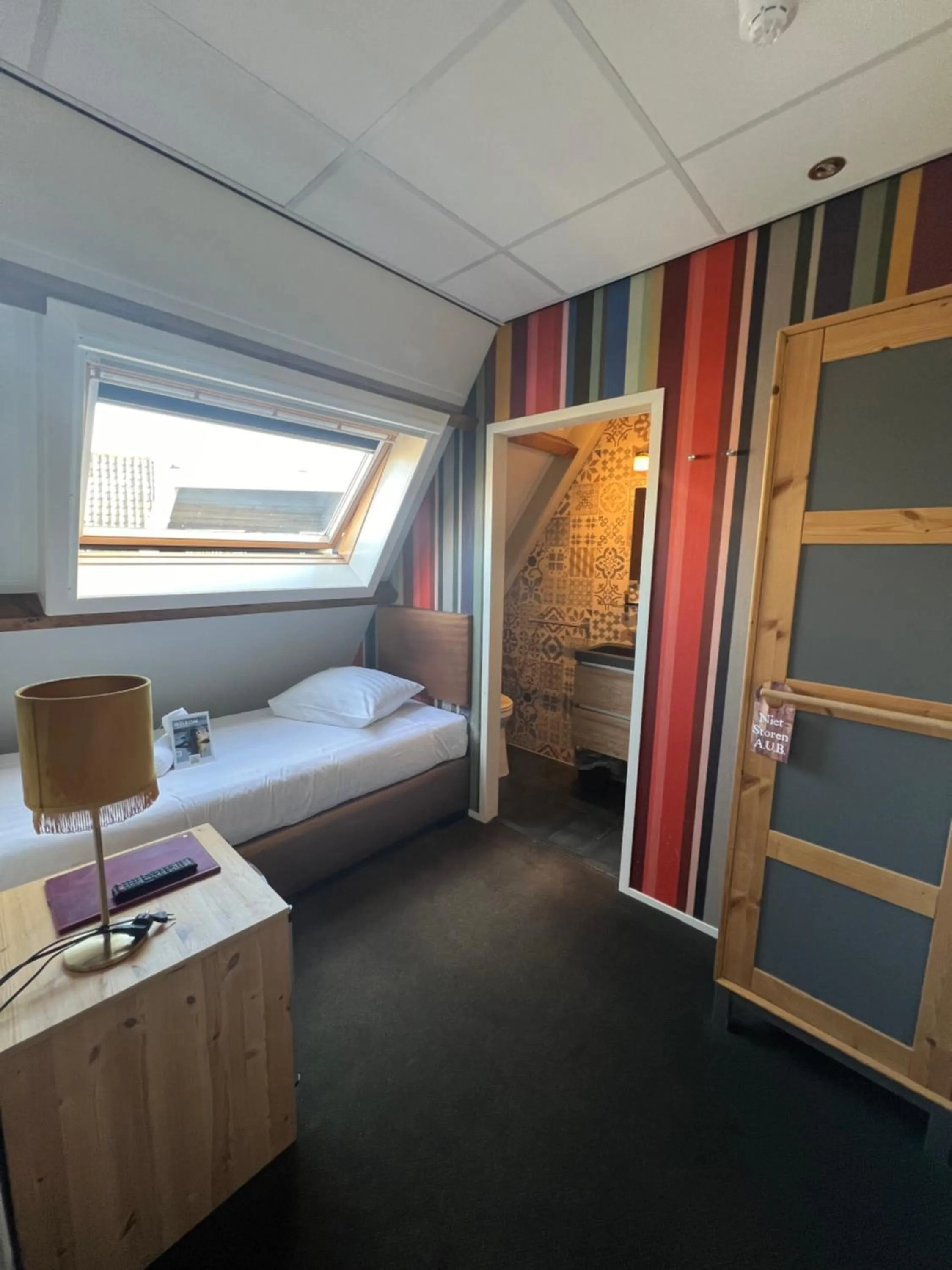 Bed in Hotel West Inn