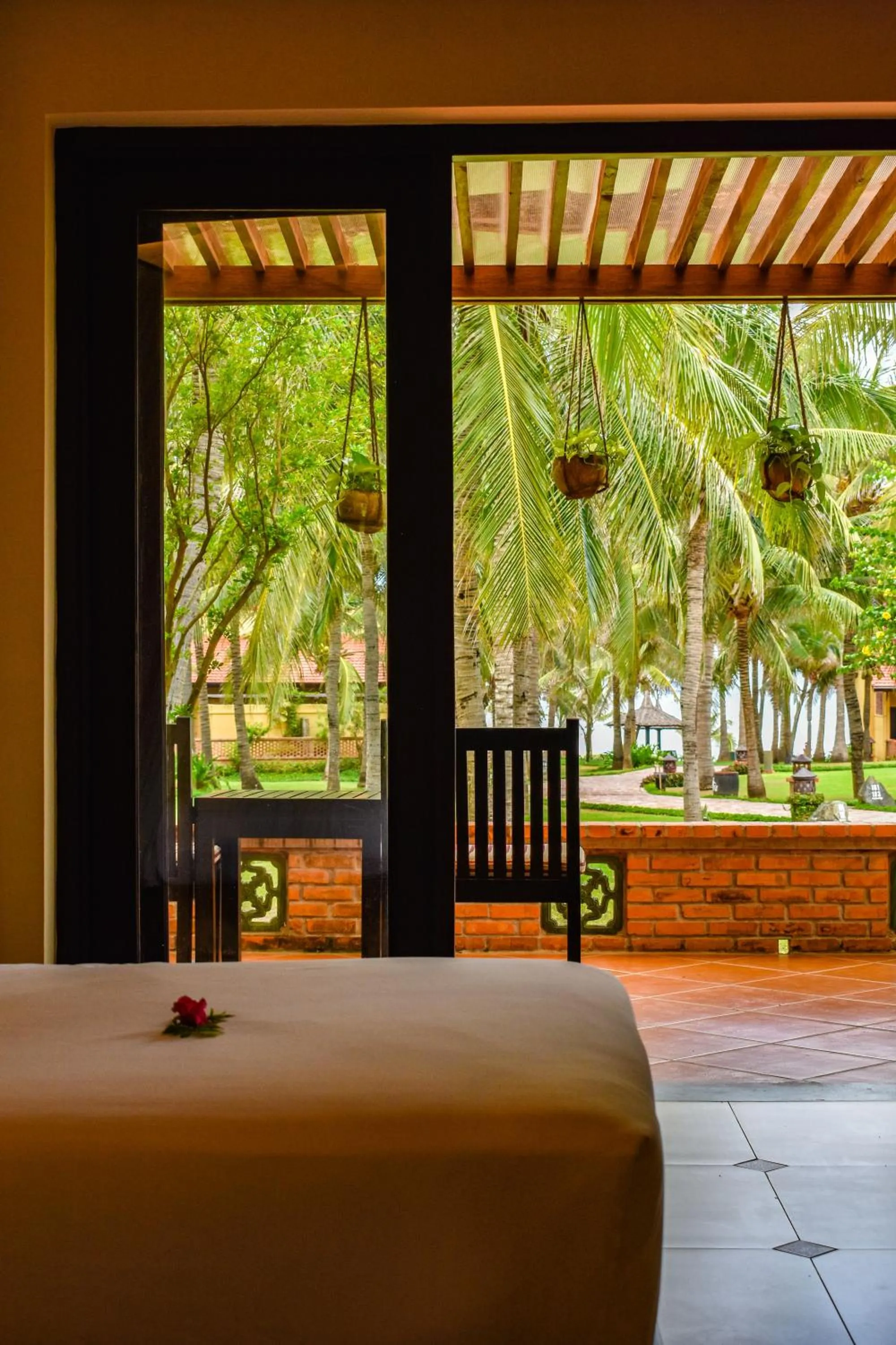 Balcony/Terrace, Bed in Pandanus Resort