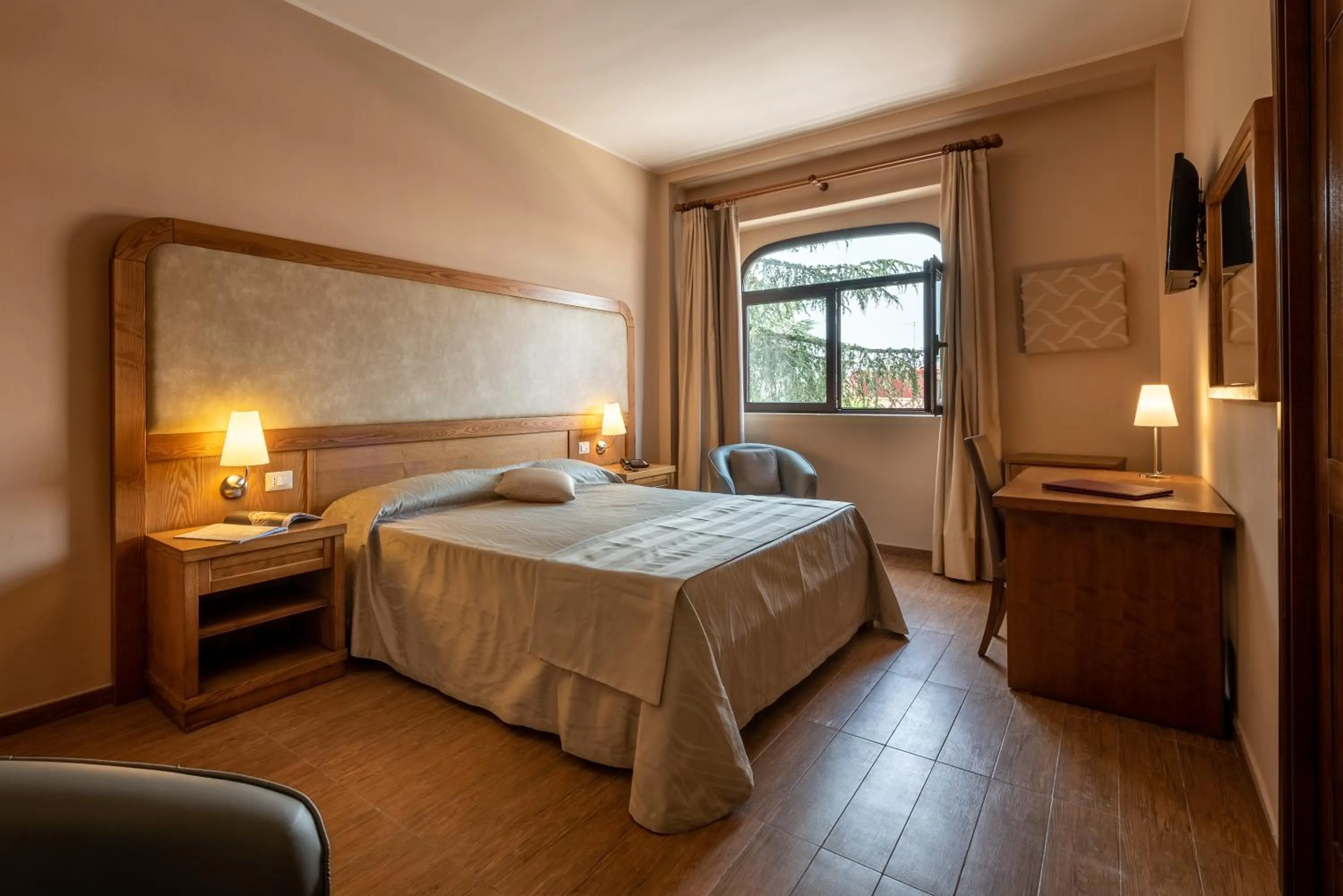 Bedroom in Leone de Castris Wine Hotel