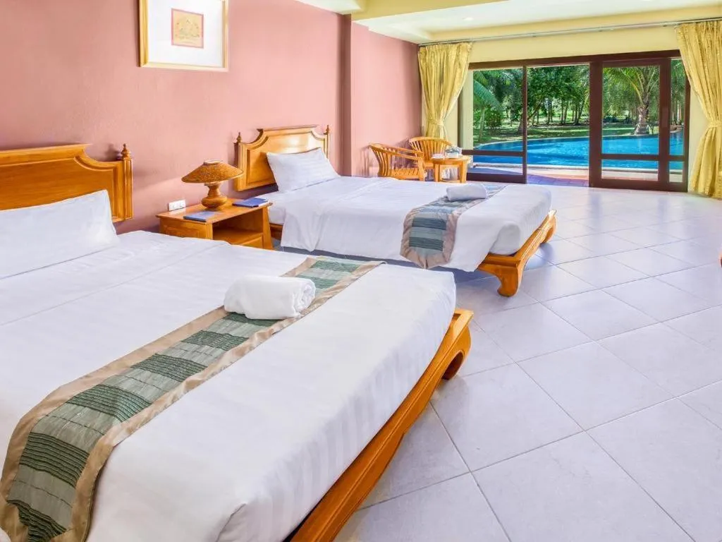 Bed in Khaolak Mohin Tara Resort - SHA Certified