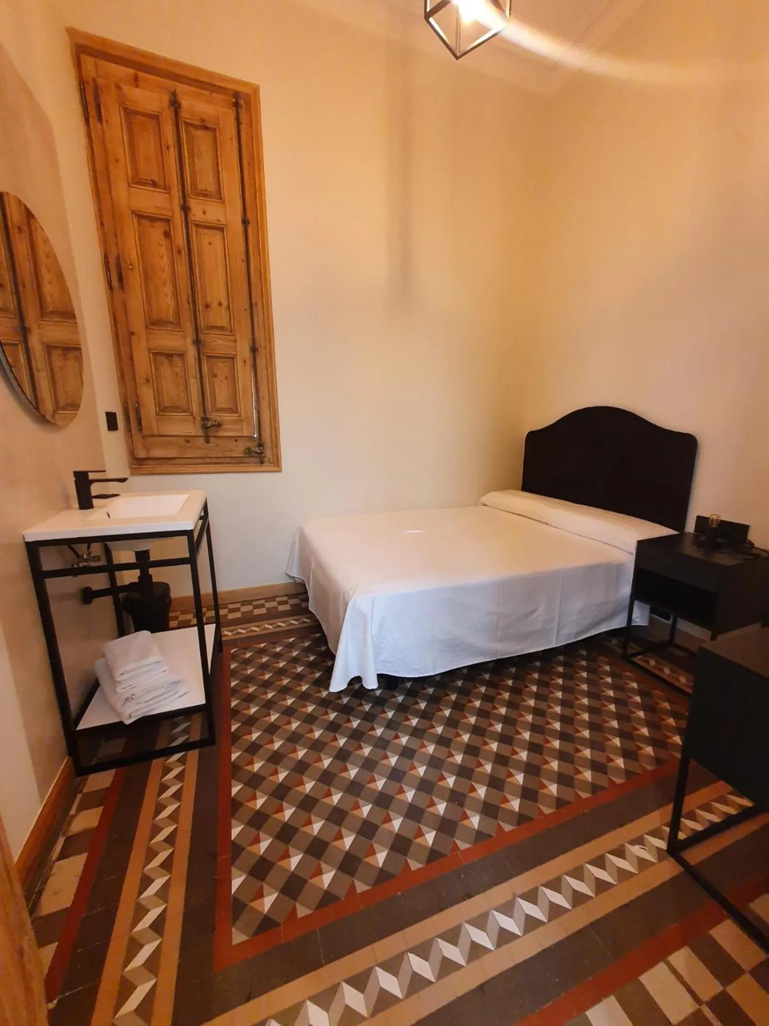 Photo of the whole room, Bed in Hostal Lausanne