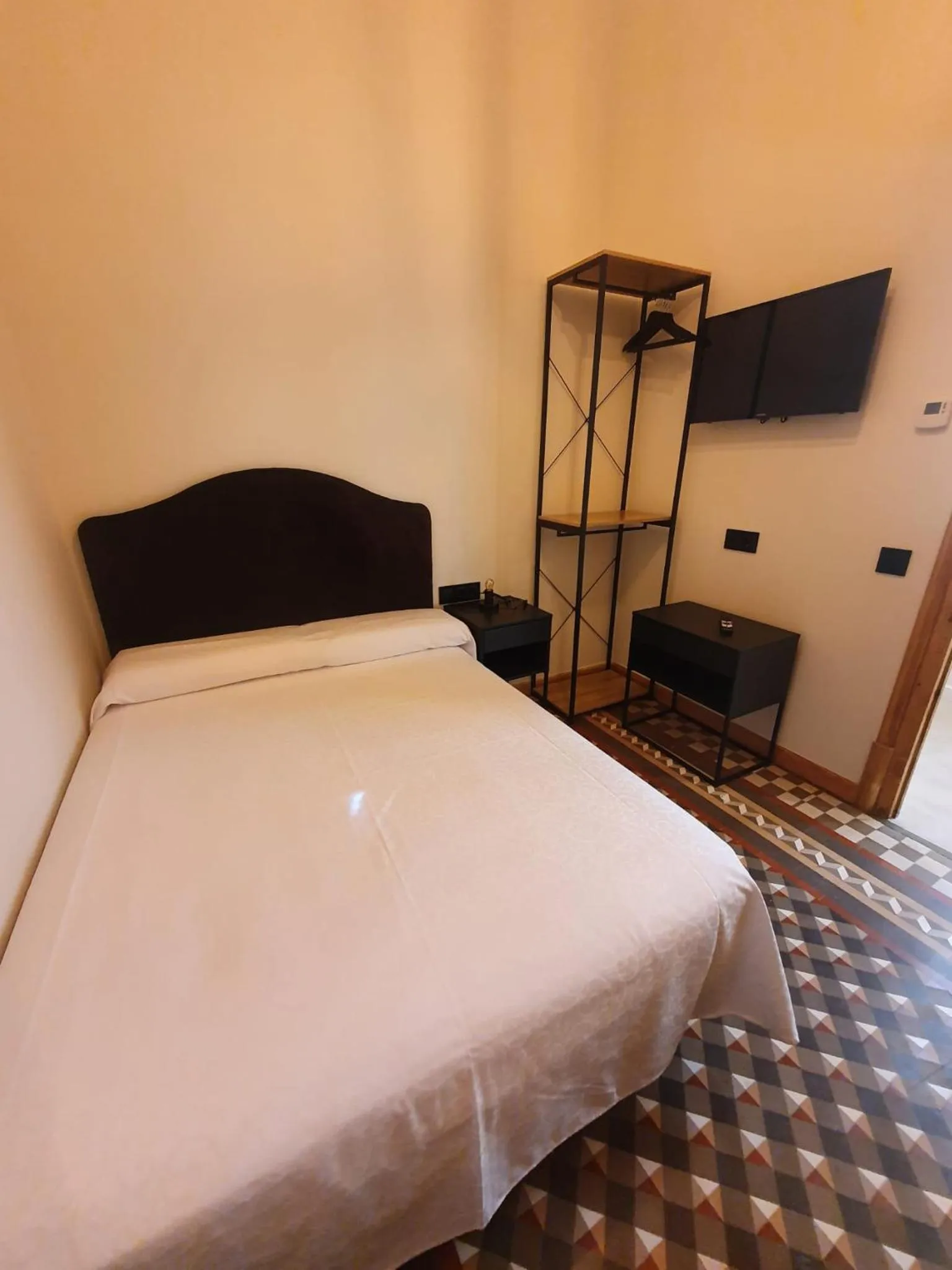 Photo of the whole room, Bed in Hostal Lausanne