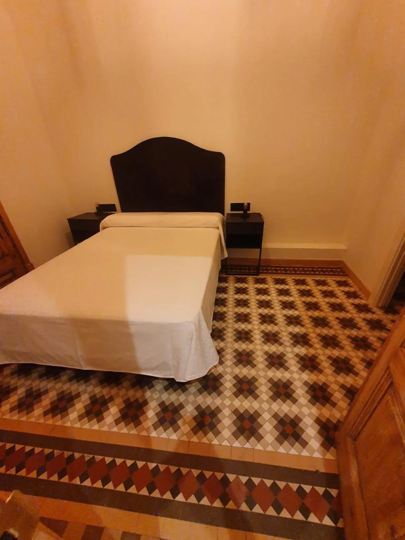 Photo of the whole room, Bed in Hostal Lausanne