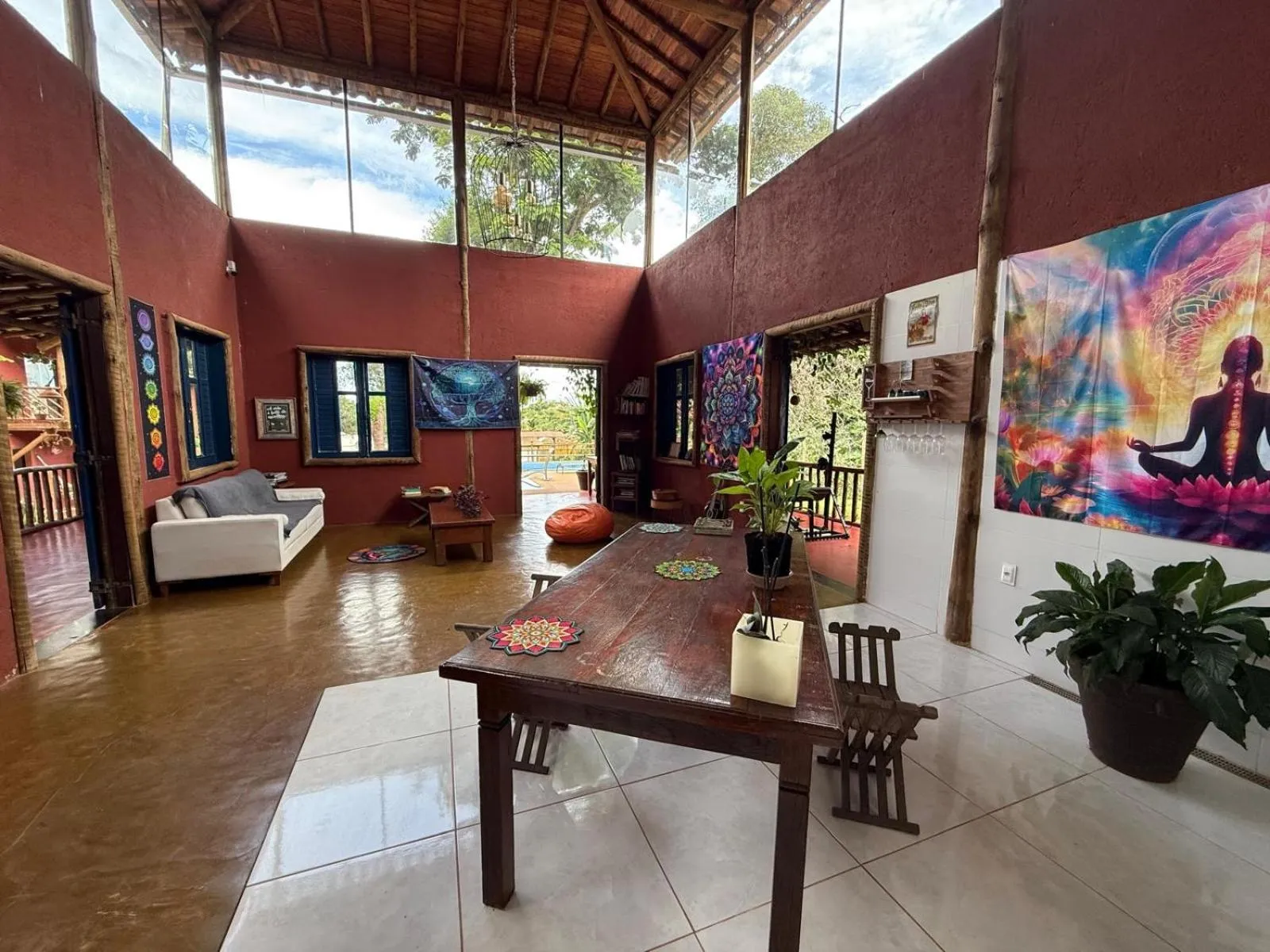 Living room in A Mi Manera Pousada , cerveja própria e Bistrô !