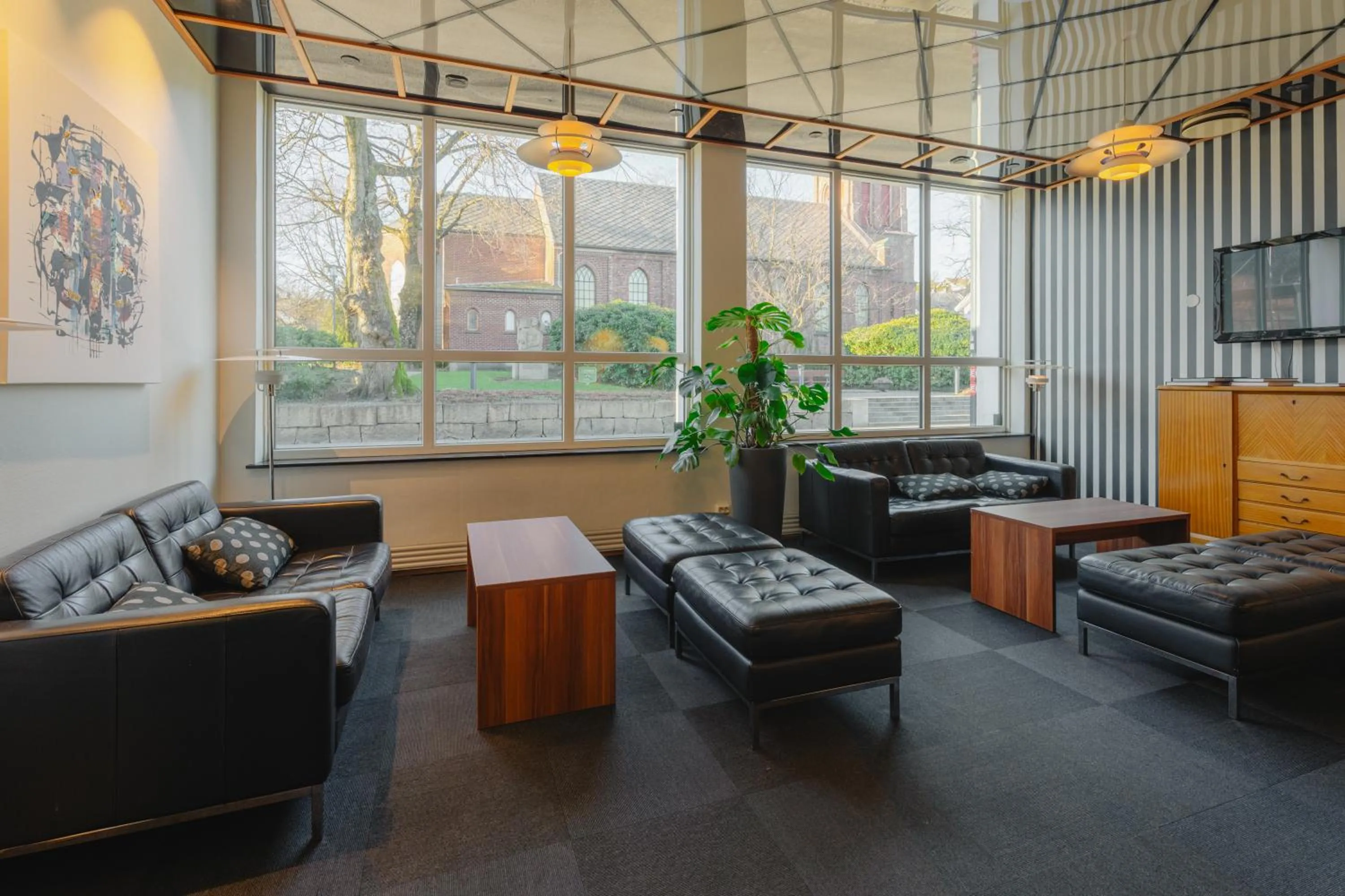 Communal lounge/ TV room in Hotel Sverre