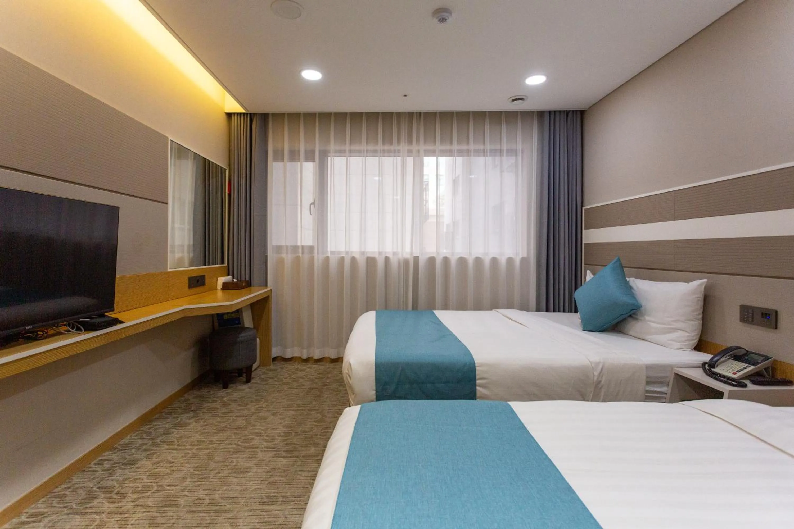 Bed in The Recenz Dongdaemun Hotel