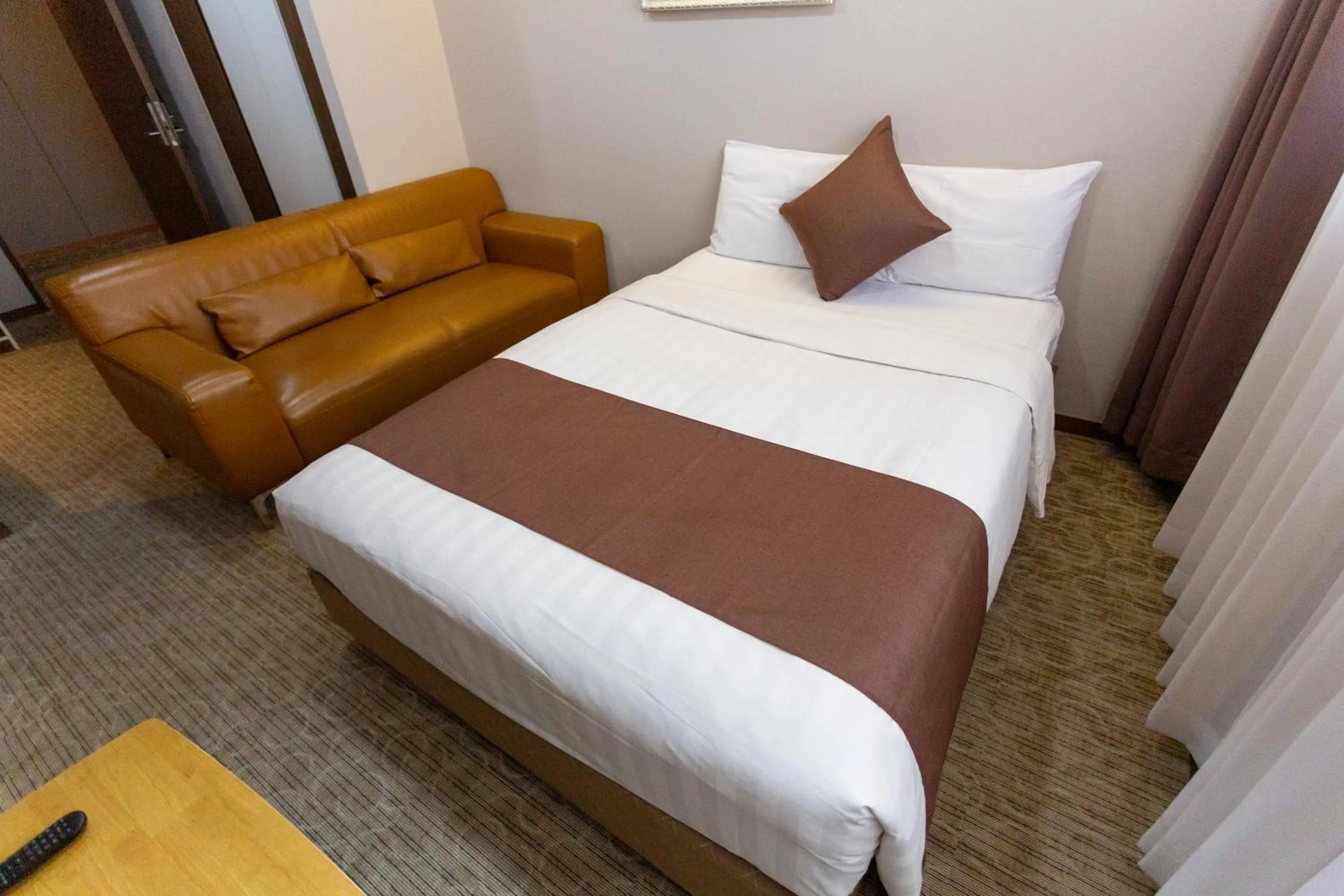 Bed in The Recenz Dongdaemun Hotel