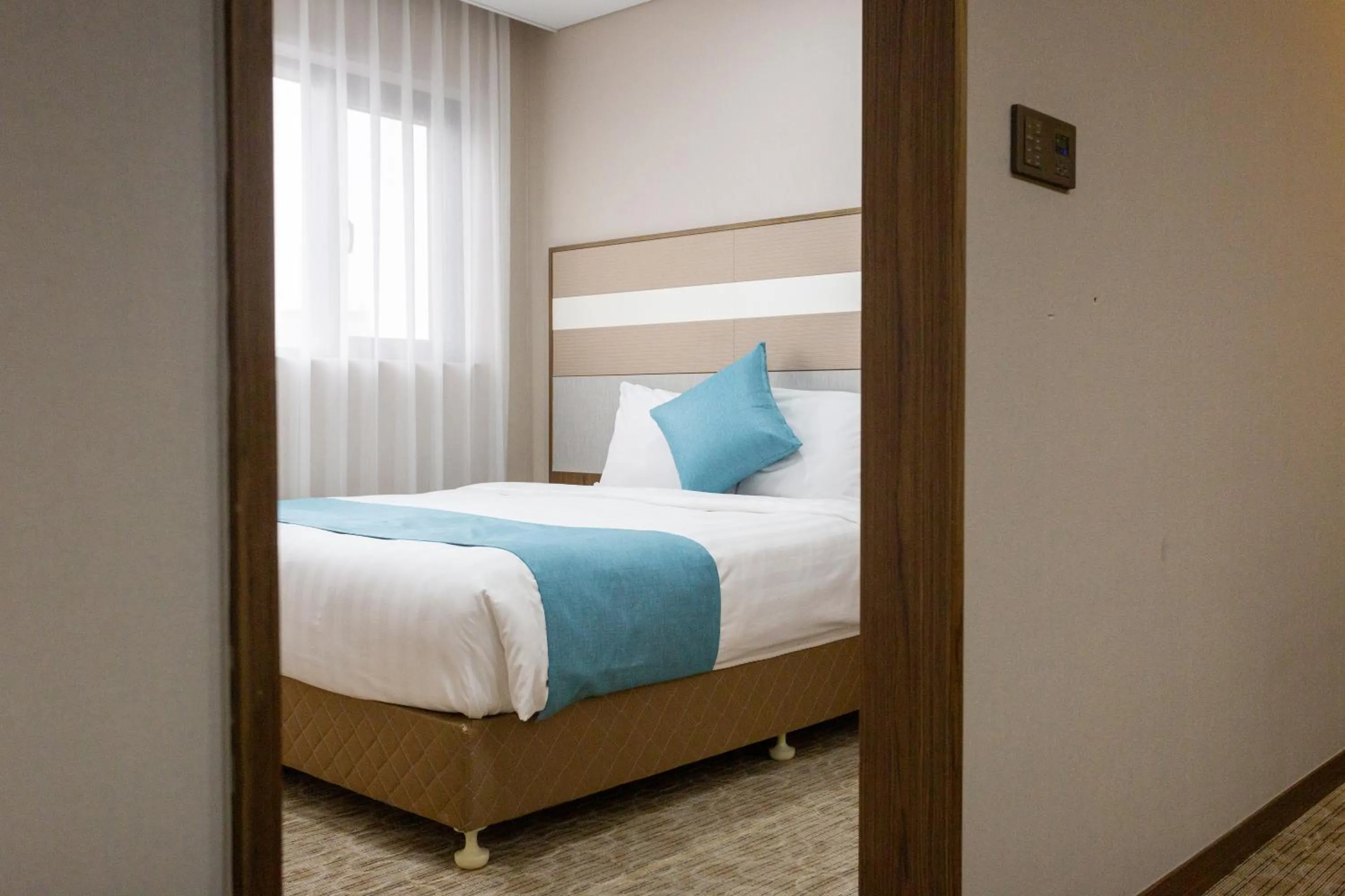 Bed in The Recenz Dongdaemun Hotel