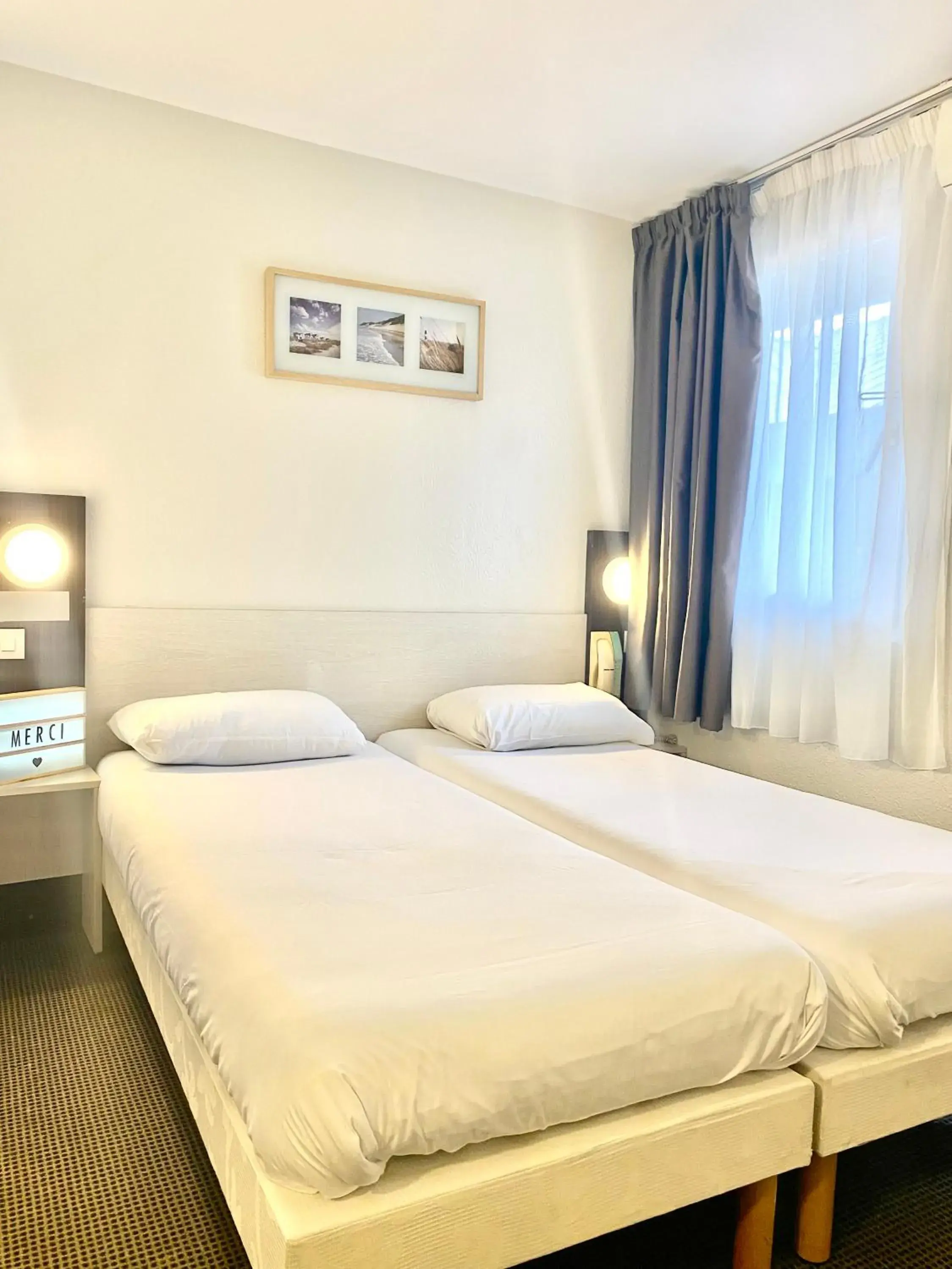 Bed in Brit Hotel Lyon Nord Dardilly Bed in Brit Hotel Lyon Nord Dardilly